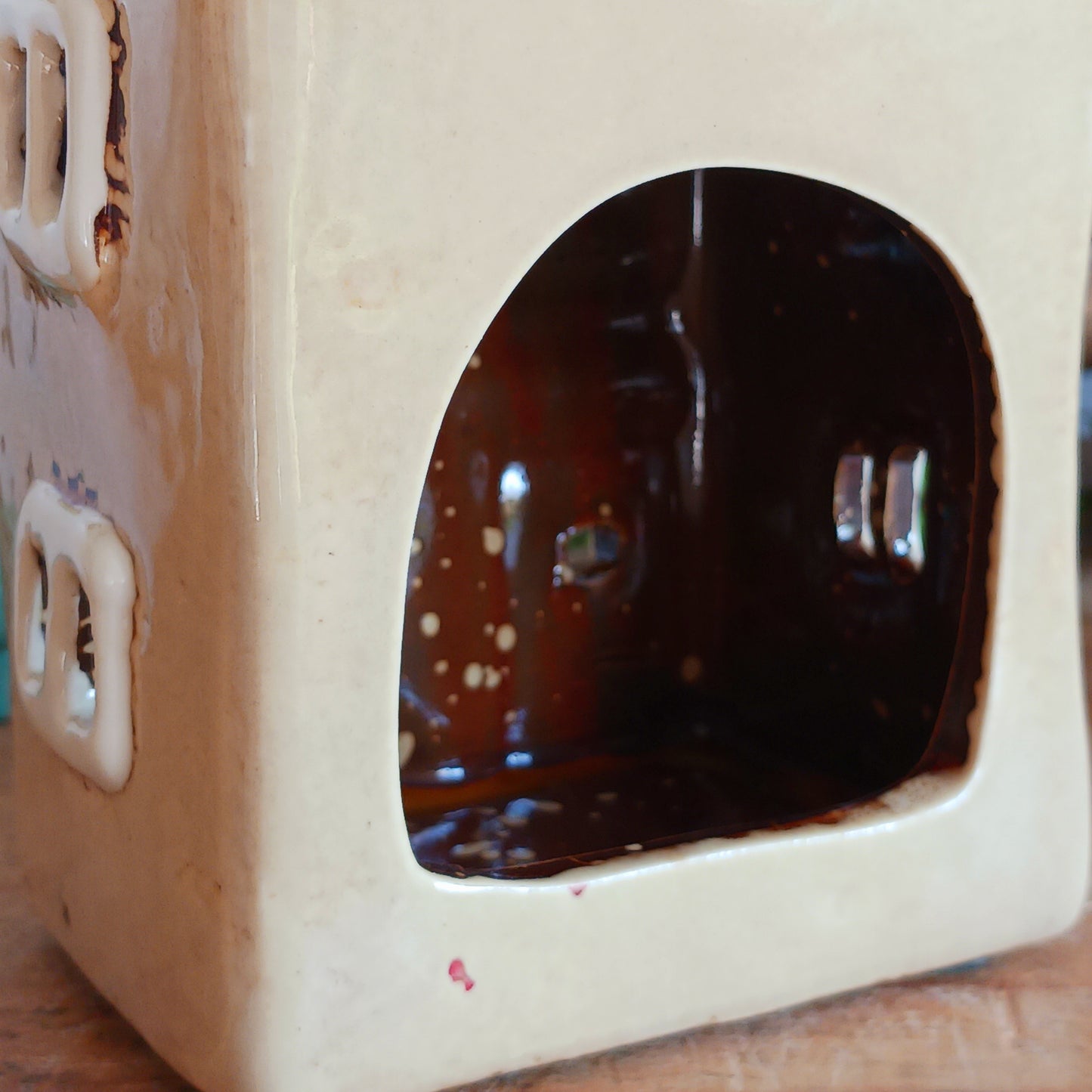 Illuminate your home with the charming Village Pottery Green Grocers Shop Tealight Holder. Handcrafted with a rustic green finish, this cosy piece adds warmth and ambience to any room. Perfect for tealights or simply as a decorative ornament, it’s a delightful addition to shelves, windowsills, or coffee tables. Pair with other pieces from the Village Pottery Collection to create your own quaint, decorative village.