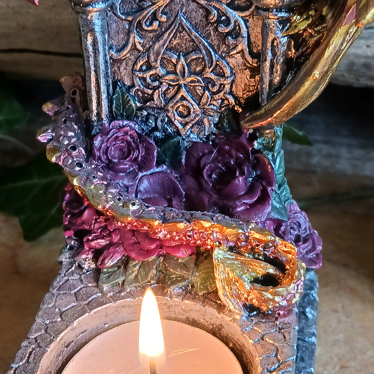 Bring a touch of mythical magic to your home with the Light of the Dragon Red Ornamental Tealight Holder. Featuring an enchanting red dragon coiled around a tombstone-style base, this intricately detailed candle holder is perfect for fantasy lovers and collectors of unusual home décor.
