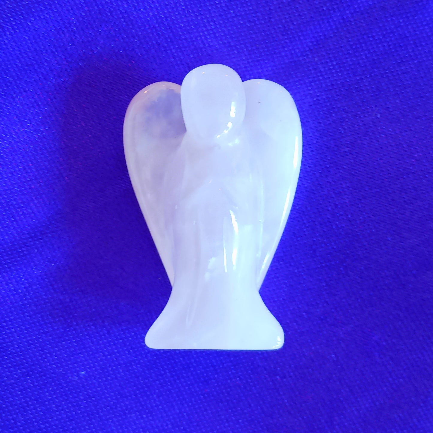These little hand carved rose quartz crystal pocket angels are lovely as gifts. Each crystal angel is unique. They are designed to be held, placed in little corners or can be kept in your pocket.