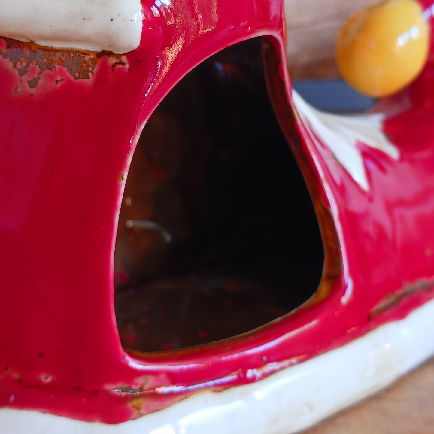 Step into the world of festive enchantment with the Village Pottery Christmas Elf Boot House Tealight Holder, a playful handcrafted ceramic creation bursting with Christmas spirit. Measuring 16 x 16 x 9.5 cm, this delightful piece takes the shape of a cheerful elf’s boot turned into a cosy little house, complete with twinkling windows and snowy details.