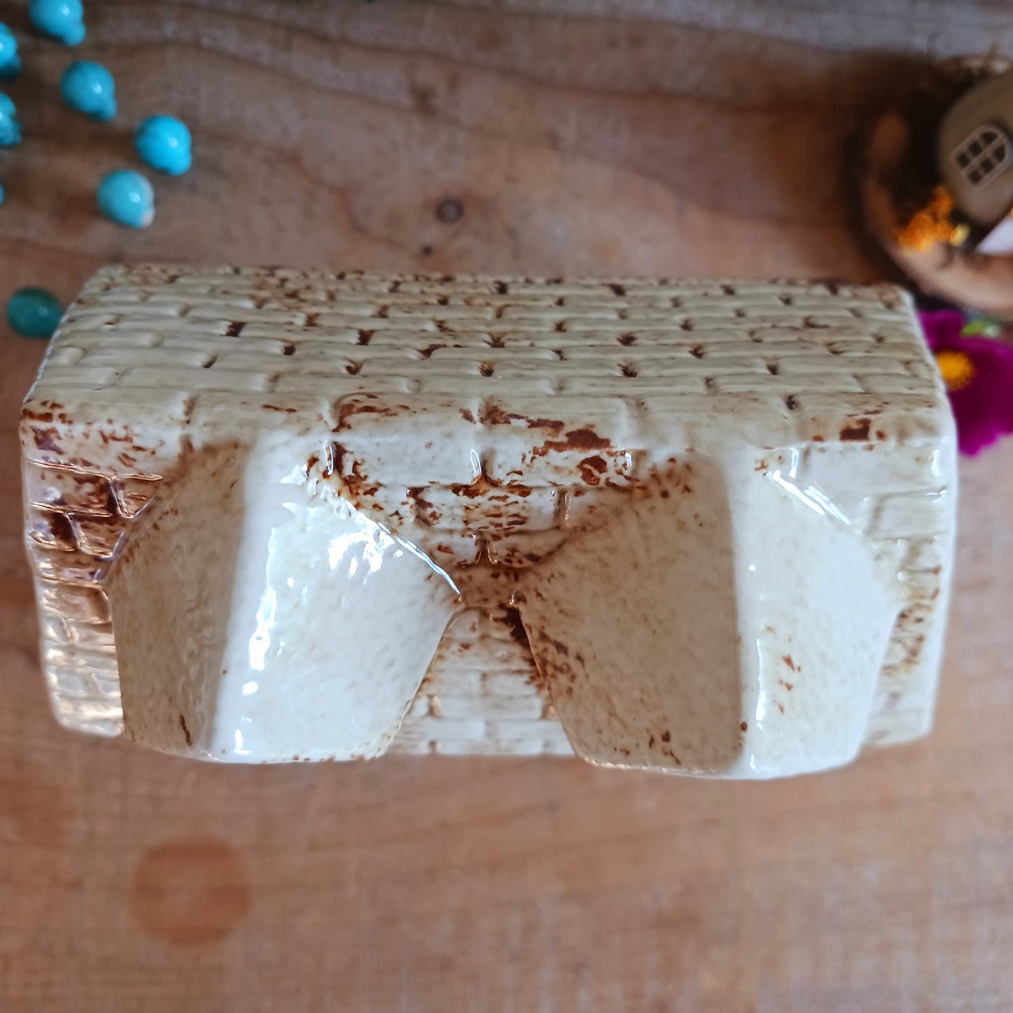 Transform your home into a warm and inviting sanctuary with the Village Pottery Tea Rooms Tealight Holder. Crafted from quality ceramic, this charming rustic piece creates a cosy, nostalgic glow when lit with a tealight. More than just a candle holder, it doubles as a delightful decorative ornament for your coffee table, shelf, or windowsill.