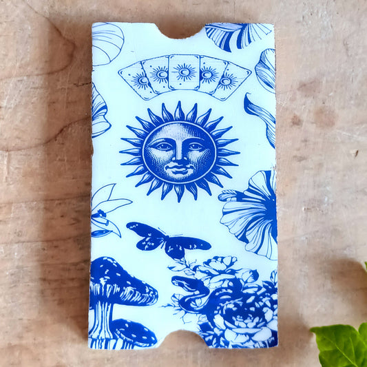 Elevate your spiritual practice with this beautifully crafted Ceramic Sun Tarot Card Box, designed for intuitive readers and ritual-focused practitioners. Featuring a striking ceramic sun symbol, this piece represents intuition, clarity, and spiritual balance—making it both a functional storage solution and a meaningful altar addition.