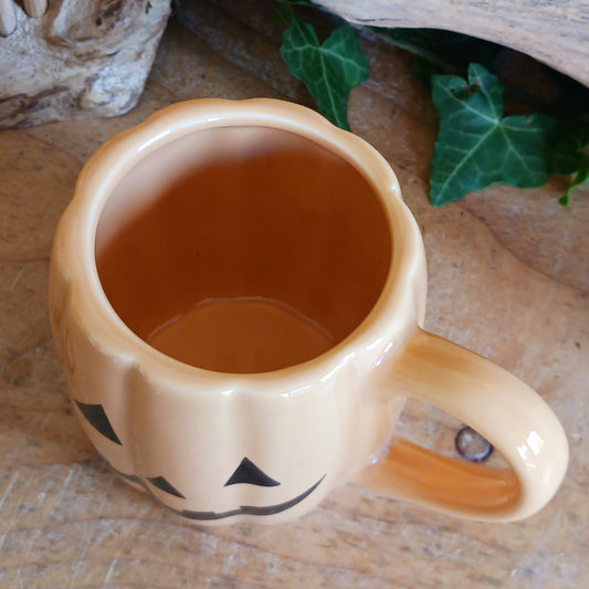 Enjoy your favourite Halloween brews in spooky style with this smiling Jack-o'-lantern pumpkin mug! Featuring a fun pumpkin-shaped design and a cheerful smiling face, this novelty Halloween mug is perfect for adding a touch of seasonal charm to your morning coffee, afternoon tea or favourite hot chocolate.