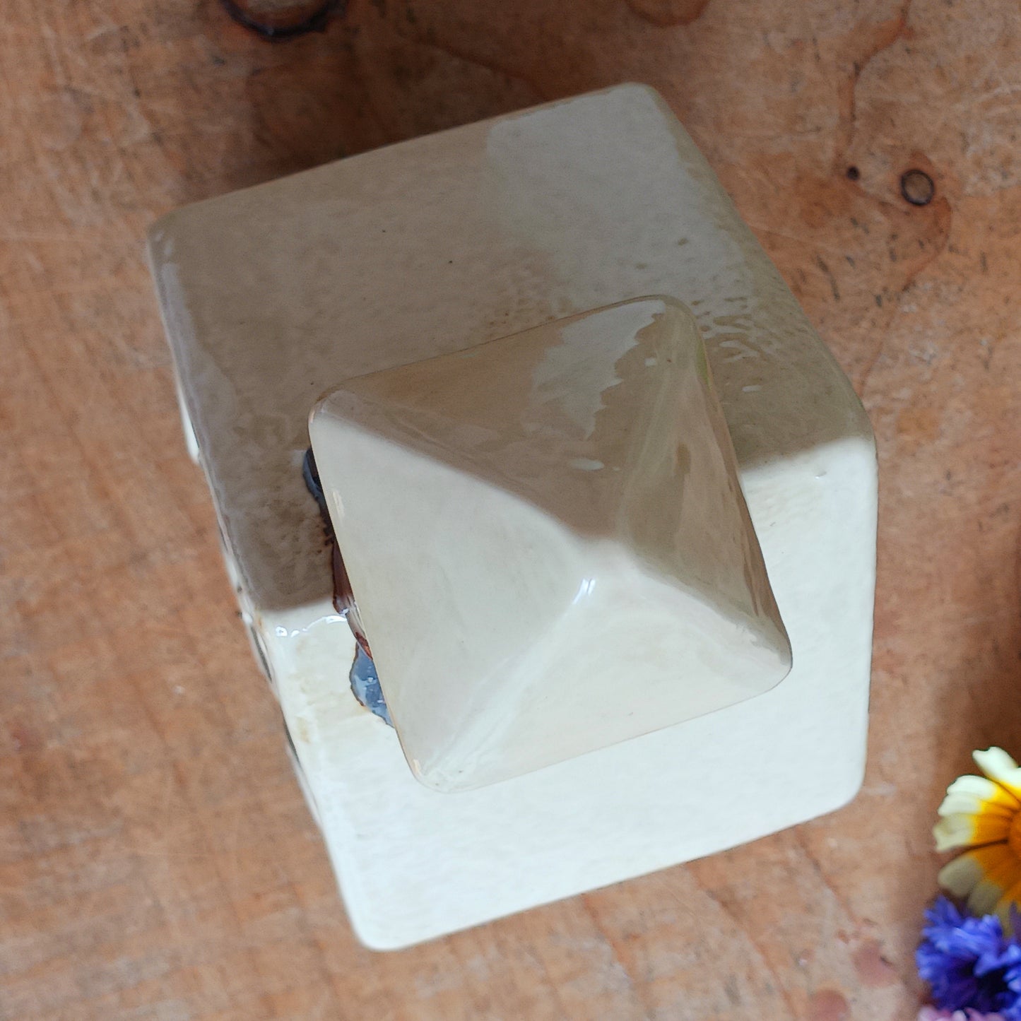 Illuminate your sacred space with the enchanting Village Pottery Church Tealight from BuddhaMoon. This beautifully handcrafted ceramic tealight holder features a quaint village church, complete with a small bell that captures the spirit of Village tradition and tranquility.