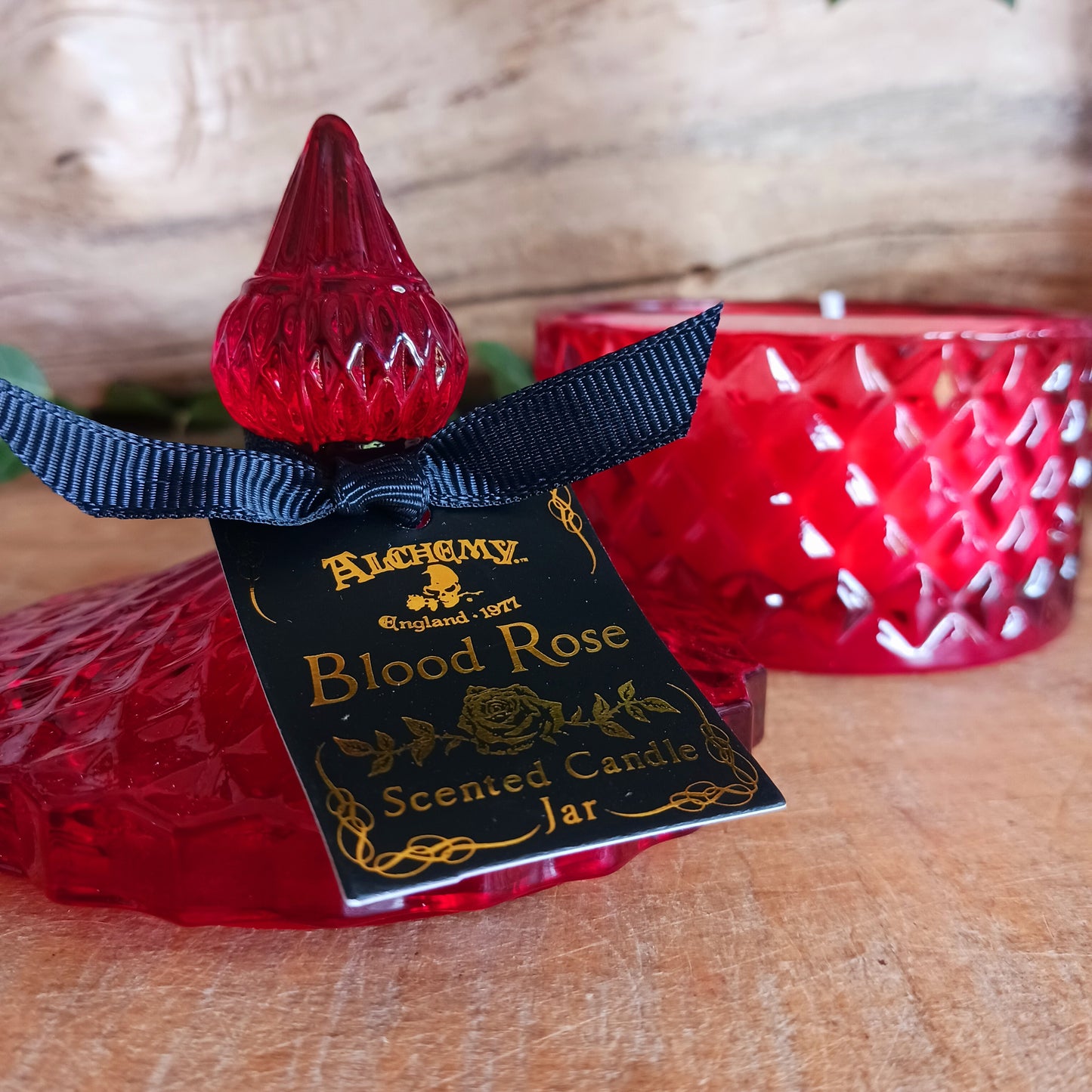 This Blood red vintage inspired, square, cut glass effect lidded candle jar encapsulates a sensual scented candle. Light the candle and let the dark sensual aroma of the 'Blood Rose' envelop your boudoir!