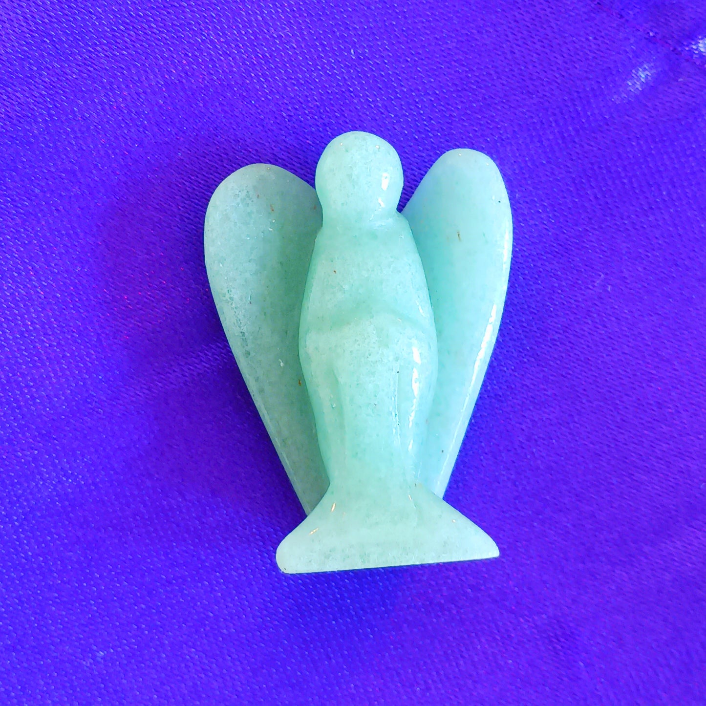 These little hand carved green aventurine crystal pocket angels are lovely as gifts. Each crystal angel is unique. They are designed to be held, placed in little corners or can be kept in your pocket.