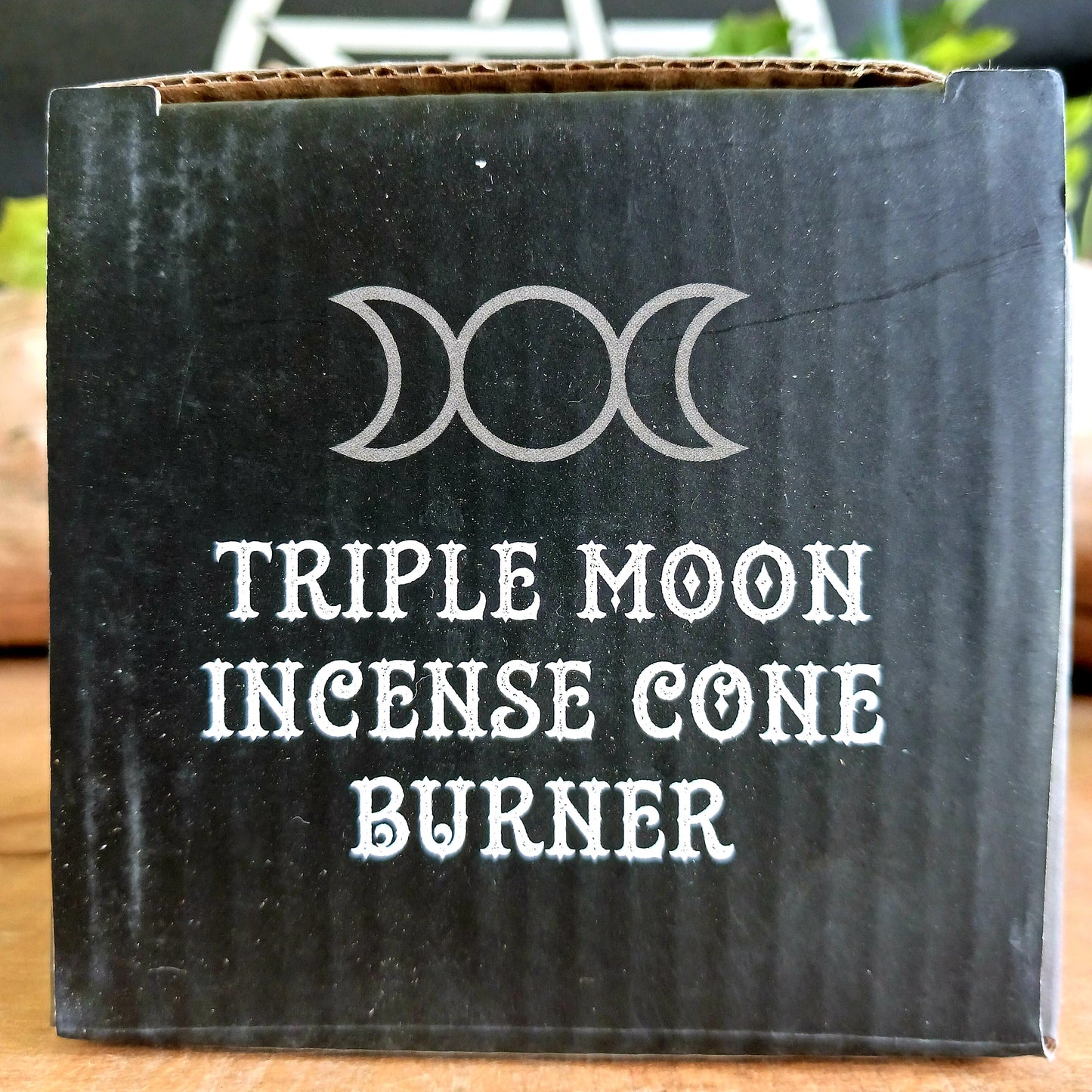 Create a mystical atmosphere in your space with this beautifully crafted Triple Moon Cauldron Incense Burner. Designed for both function and aesthetic appeal, this enchanting resin burner allows you to place an incense cone inside and watch as fragrant smoke gently rises through the top, creating a calming and magical ambiance.