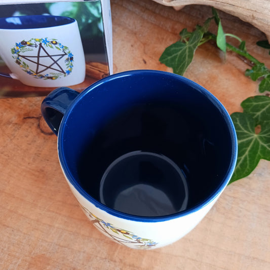 Celebrate the magic of the seasons with this Solstice Wreath Botanical Pentagram Mug, designed for those who love mystical décor, nature-inspired artwork and cosy rituals. Featuring a beautiful botanical pentagram wreath, this enchanting mug is perfect for sipping warming coffees, herbal teas or rich hot chocolates throughout the colder months.
