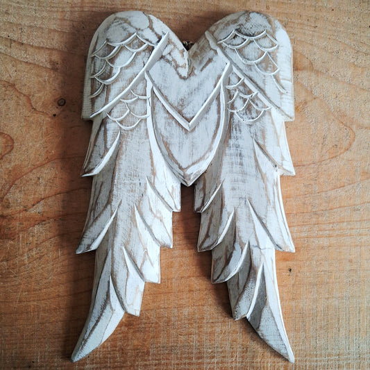 Add timeless charm to your home with these beautifully handcrafted vintage-style distressed angel wings. Expertly hand-carved from sustainable albesia wood and finished in a soft whitewashed effect, each piece is individually distressed by hand, making every set completely unique.
