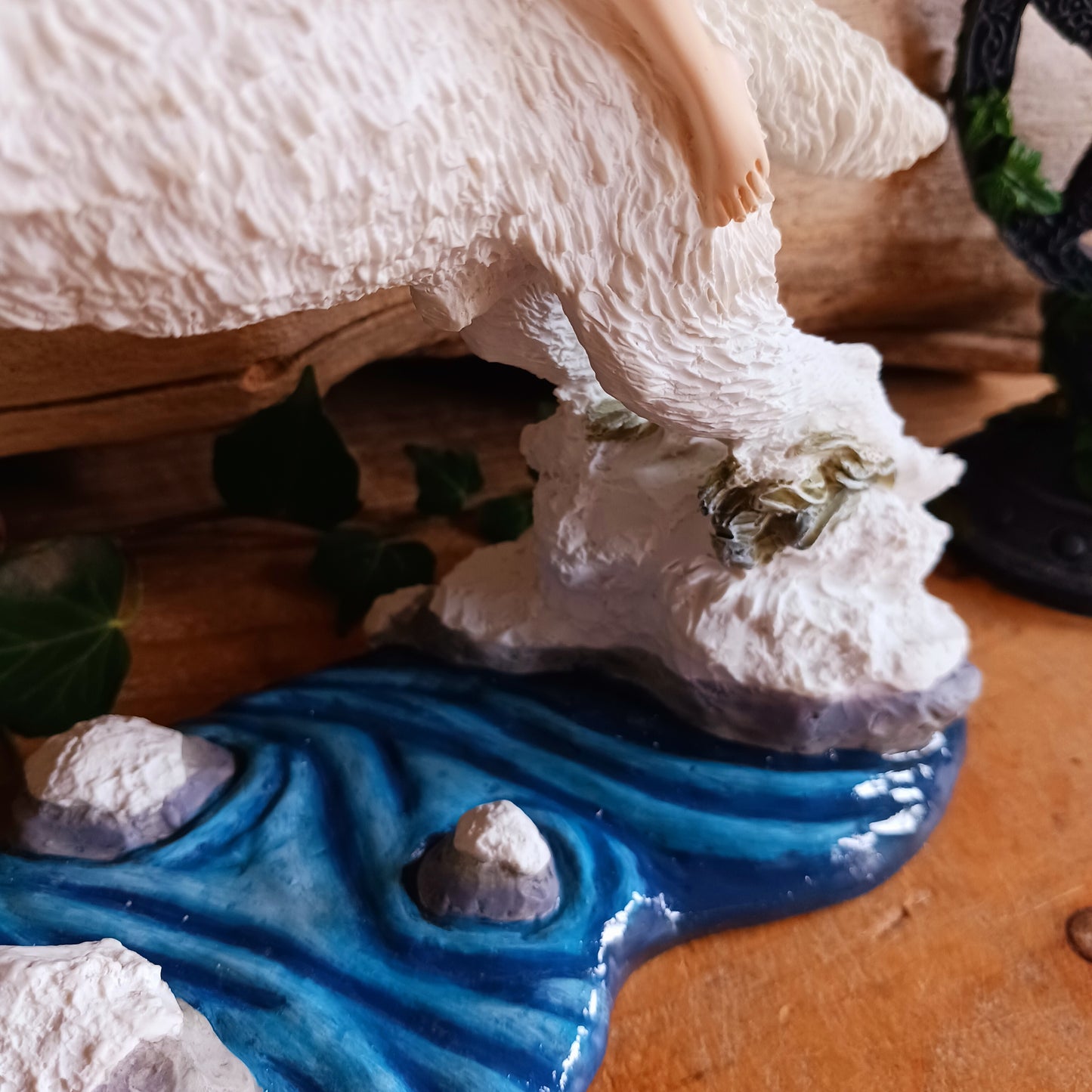 Bring a touch of magical fantasy to your home with this beautifully detailed Fairy Riding A White Wolf Statue from Nemesis Now. The dramatic figurine depicts a graceful fairy riding her loyal white wolf companion as they leap over a flowing stream, creating a striking sense of movement and adventure.