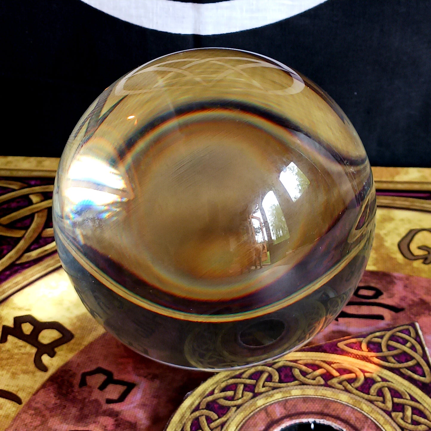 Step into the mystical world of divination with this Wiccan Witchcraft Divination Crystal Ball. This large flawless orbuculum measures 11cm and is flawlessly clear and spherical.  A must-have for both budding fortune tellers and seasoned practitioners of the mystical arts.