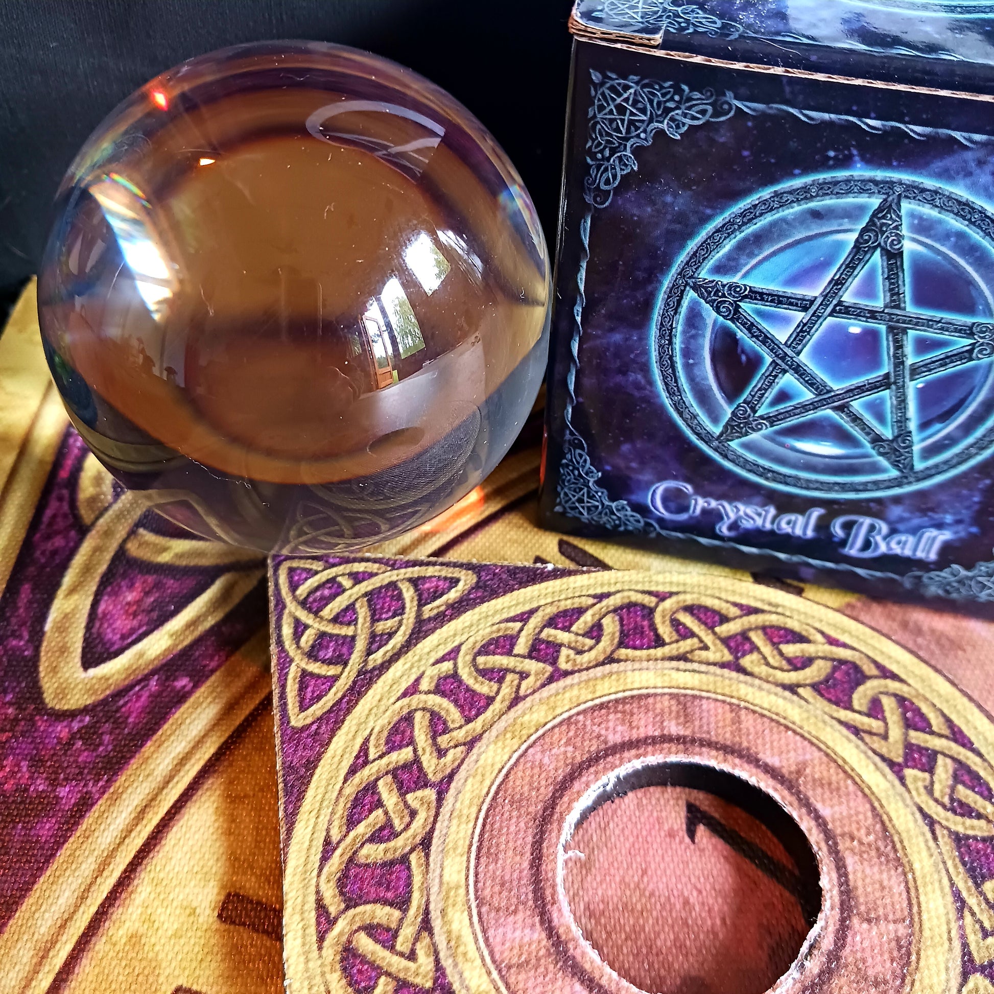 Step into the mystical world of divination with this Wiccan Witchcraft Divination Crystal Ball. This large flawless orbuculum measures 11cm and is flawlessly clear and spherical.  A must-have for both budding fortune tellers and seasoned practitioners of the mystical arts.