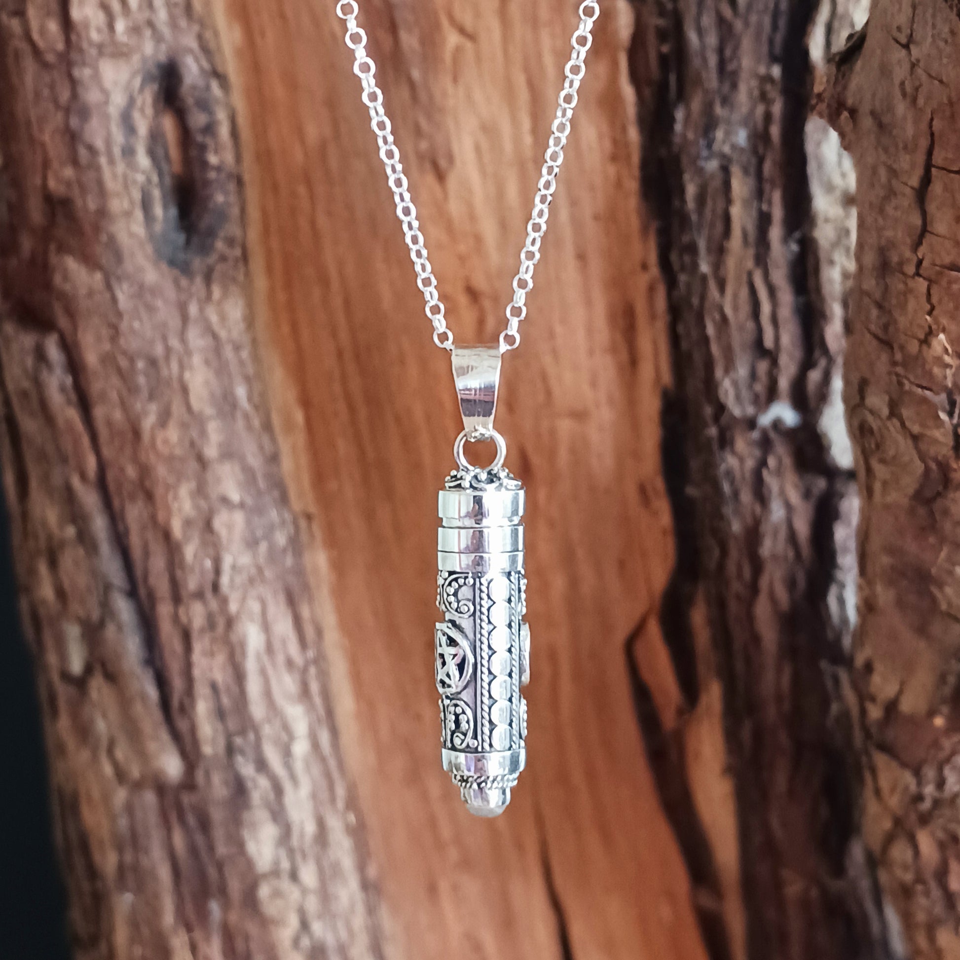 Add some white magic and mysticism to your jewellery collection with this detailed talisman amulet.  Handcrafted, sterling silver poison locket, a vessel to keep your most treasured keepsakes.&nbsp; This locket is beautifully embellished with a pentagram which represents five basic elements: earth, air, fire, water and spirit, it also serves as a symbol of the Wiccan faith.  The locket is finished with a moonstone gemstone on the base.   Size: 35mm&nbsp;