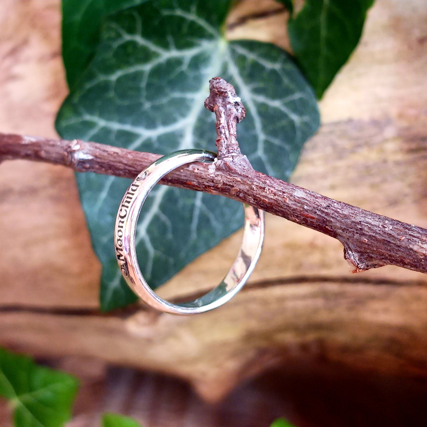 These elegant and sophisticated Sterling Silver Band rings have the words MoonChild engraved in Gothic lettering on the front.  Being a Moonchild can be a way of expressing a deep appreciation for the natural world, the cycles of life, and the mystical or spiritual aspects of the moon.  Made from Sterling Silver and available in three sizes (see below), these bands make a lovely gift for someone special.  Gifted in a black velvet pouch. &nbsp;  Sizes: UK Small, Medium, Large - U