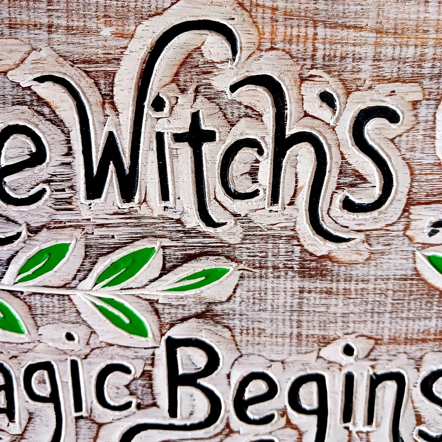 This solid wooden plaque has been hand etched and painted with the inscription: "The Witch's Garden. Magic Begins Here."