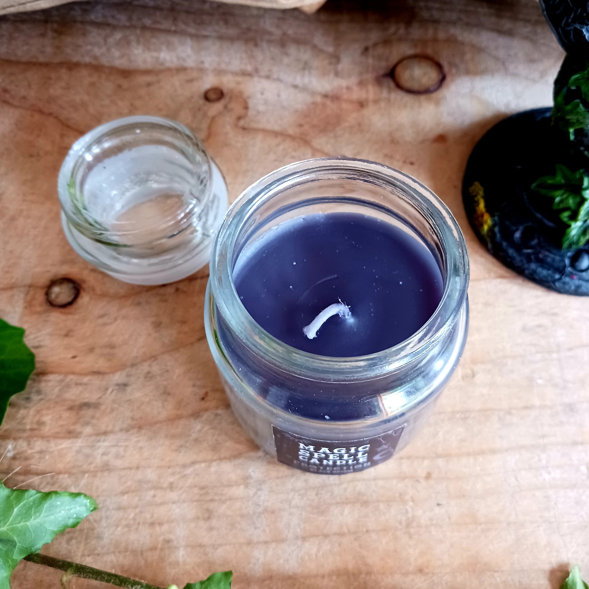 This black jar candle comes in a lovely opium fragrance and is perfect for accompanying spells of protection and guidance.  Whether used as alternative decor or as a sacred ritual tool, this candle will attract all things divine.&nbsp;