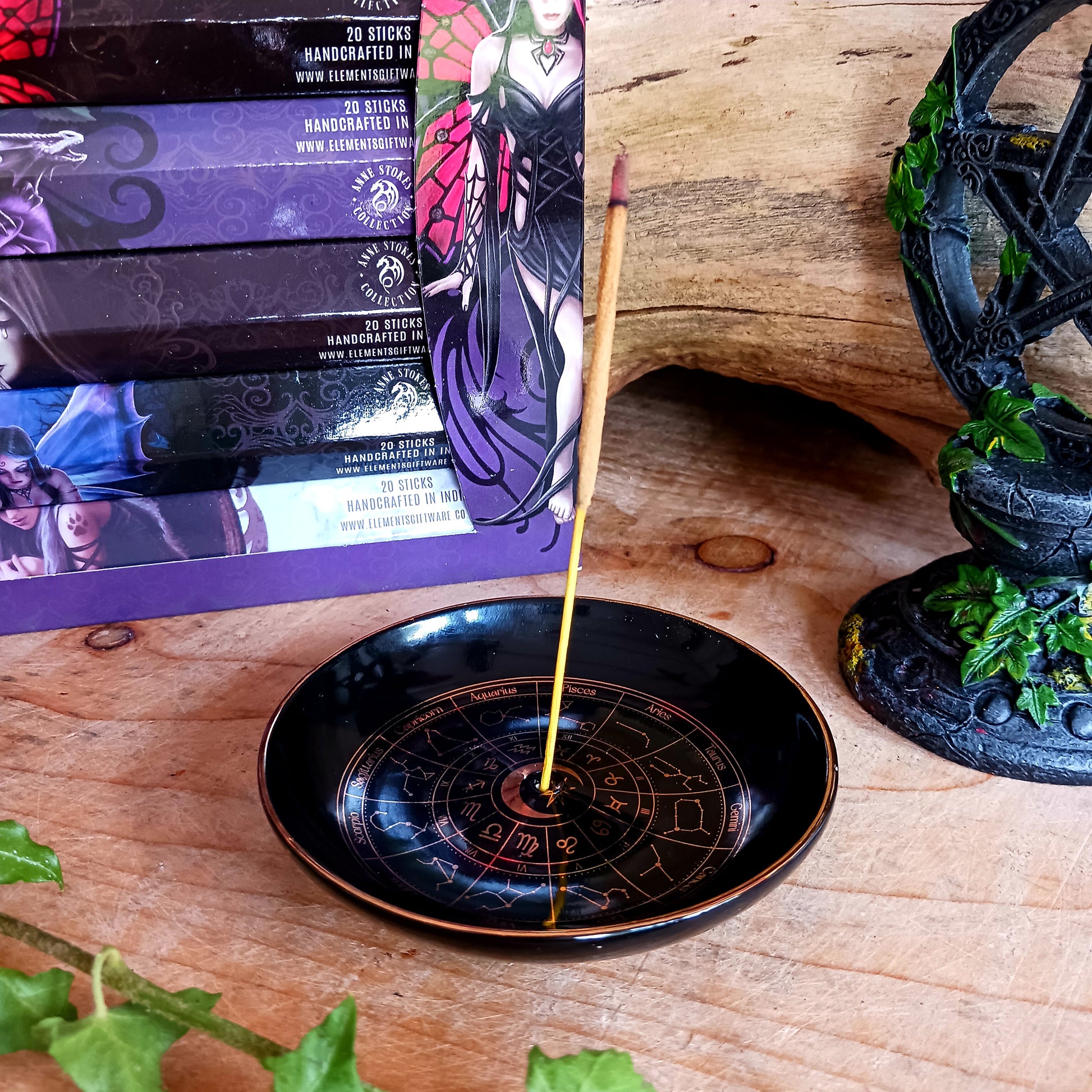 This beautiful black incense dish depicts the astrology wheel in intricate, gold effect detail for a premium look. The holder is thoughtfully designed to accommodate both incense sticks and cones, featuring a small hole in the centre for sticks and a flat stable surface suitable for burning cones. A gorgeous finishing touch for any home with celestial-inspired decor.