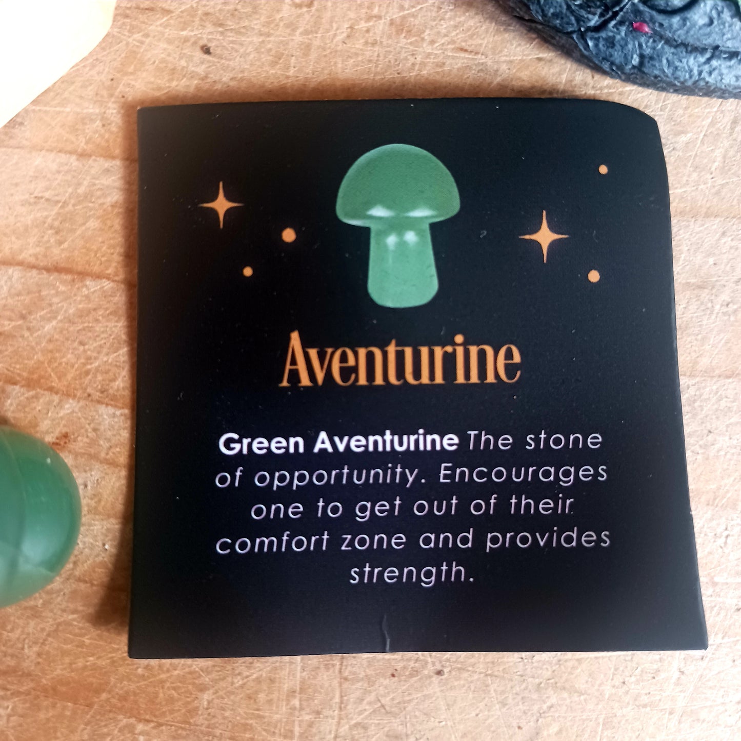 Harness the power of crystal healing with this Magical Crystal Mushroom crafted from polished aventurine. This beautiful stone promotes strength and bravery, making it a powerful tool for overcoming difficult tasks. Comes in a drawstring bag for easy storage with a matching informational insert card.