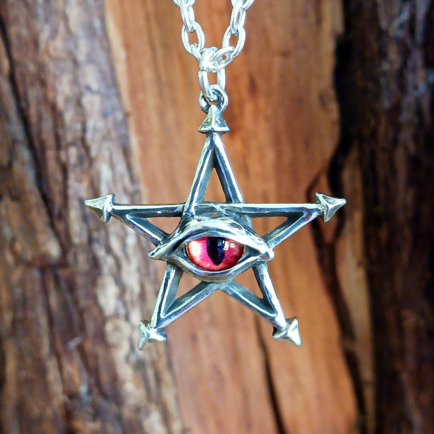 An Evil Eye amulet of great power enhanced by the underlying magical pentagram, to ward-off unmindful, malevolent curses from an erudite adversary.