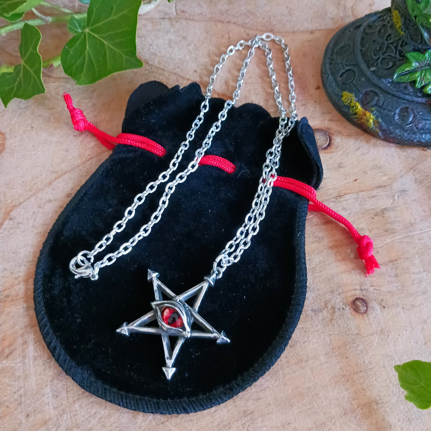 An Evil Eye amulet of great power enhanced by the underlying magical pentagram, to ward-off unmindful, malevolent curses from an erudite adversary.