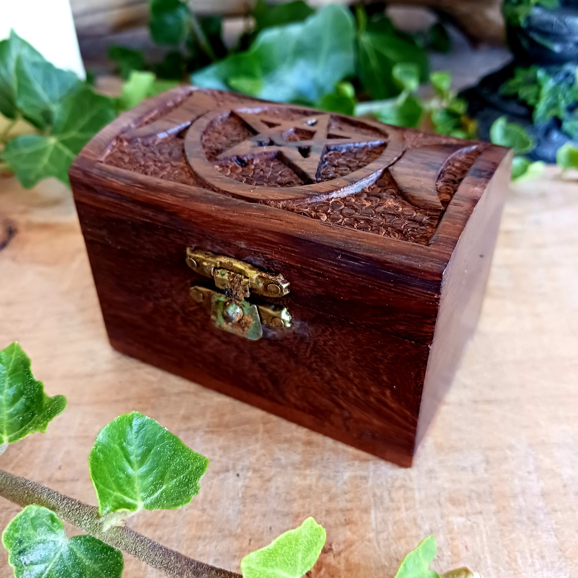 These cute little hand carved boxes have been decorated with an attractive triple goddess design and have been made from mango wood.