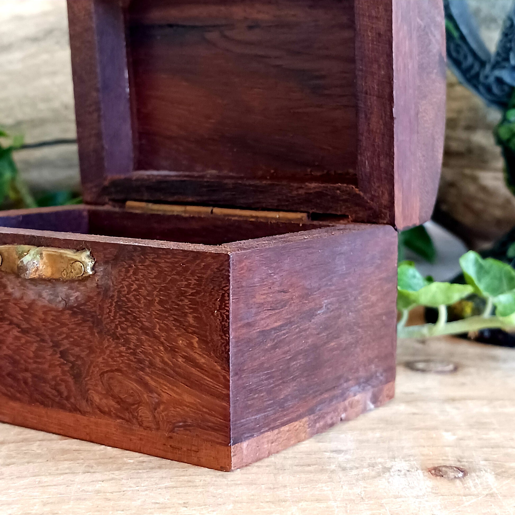 These cute little hand carved boxes have been decorated with an attractive triple goddess design and have been made from mango wood.