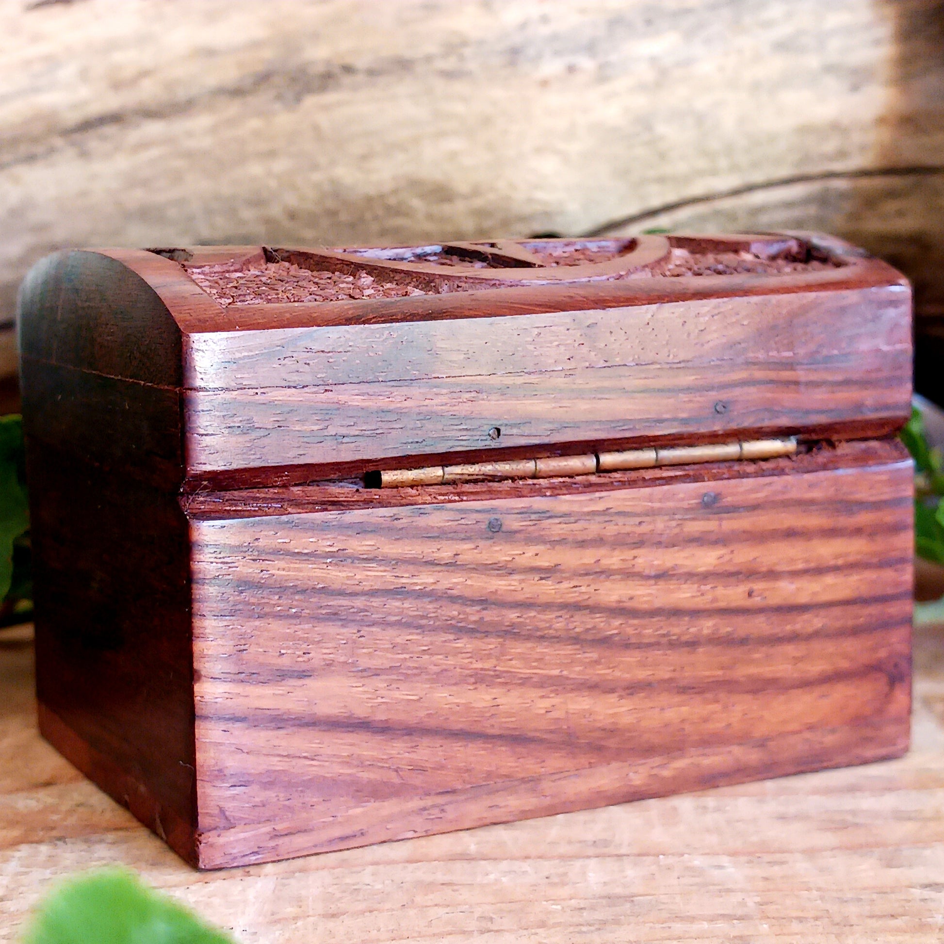 These cute little hand carved boxes have been decorated with an attractive triple goddess design and have been made from mango wood.