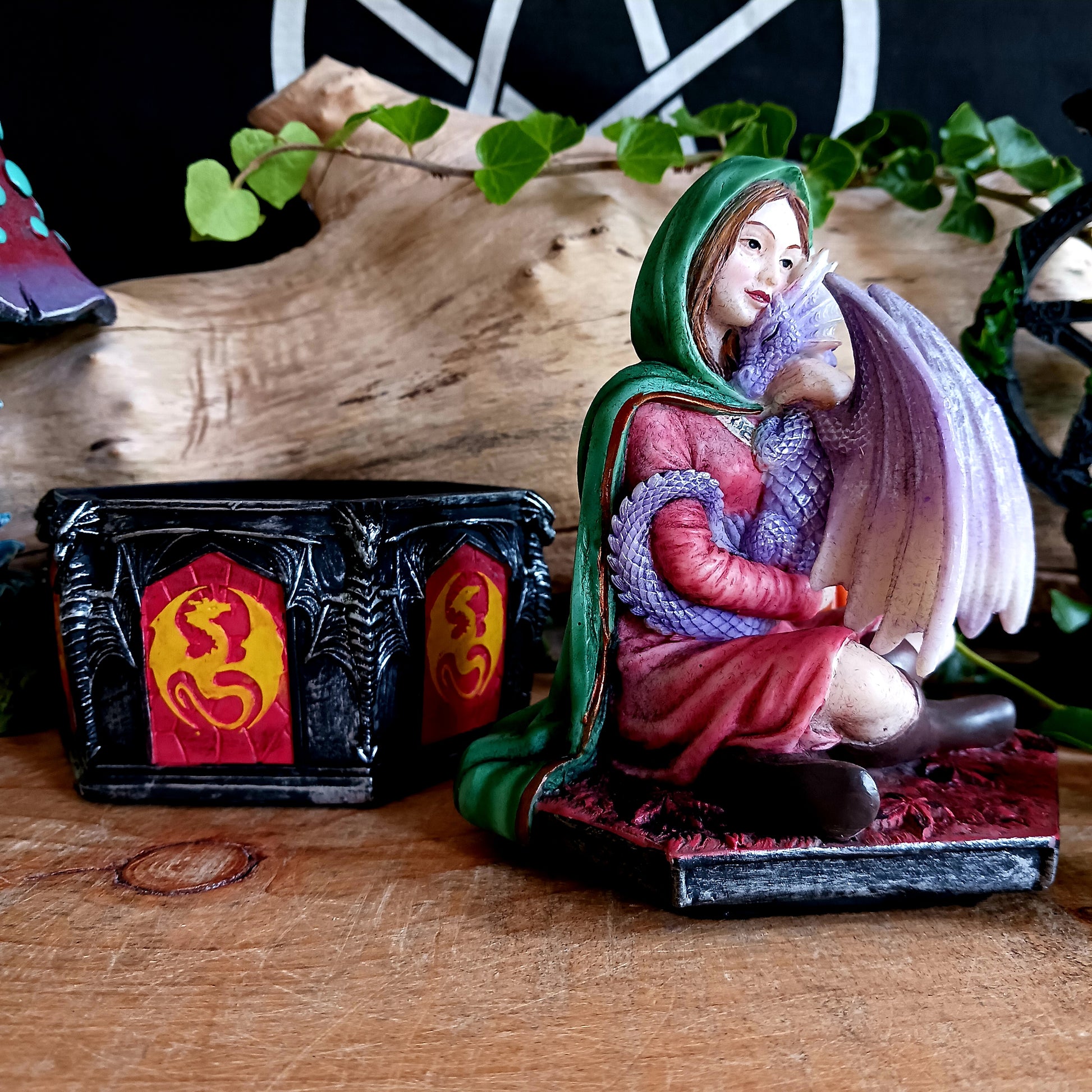 This beautifully and highly detailed resin box features an intricate figurine based on Anne Stokes' 'Safe Haven' dragon artwork, representing the warmth and comfort of fall or Autumn.