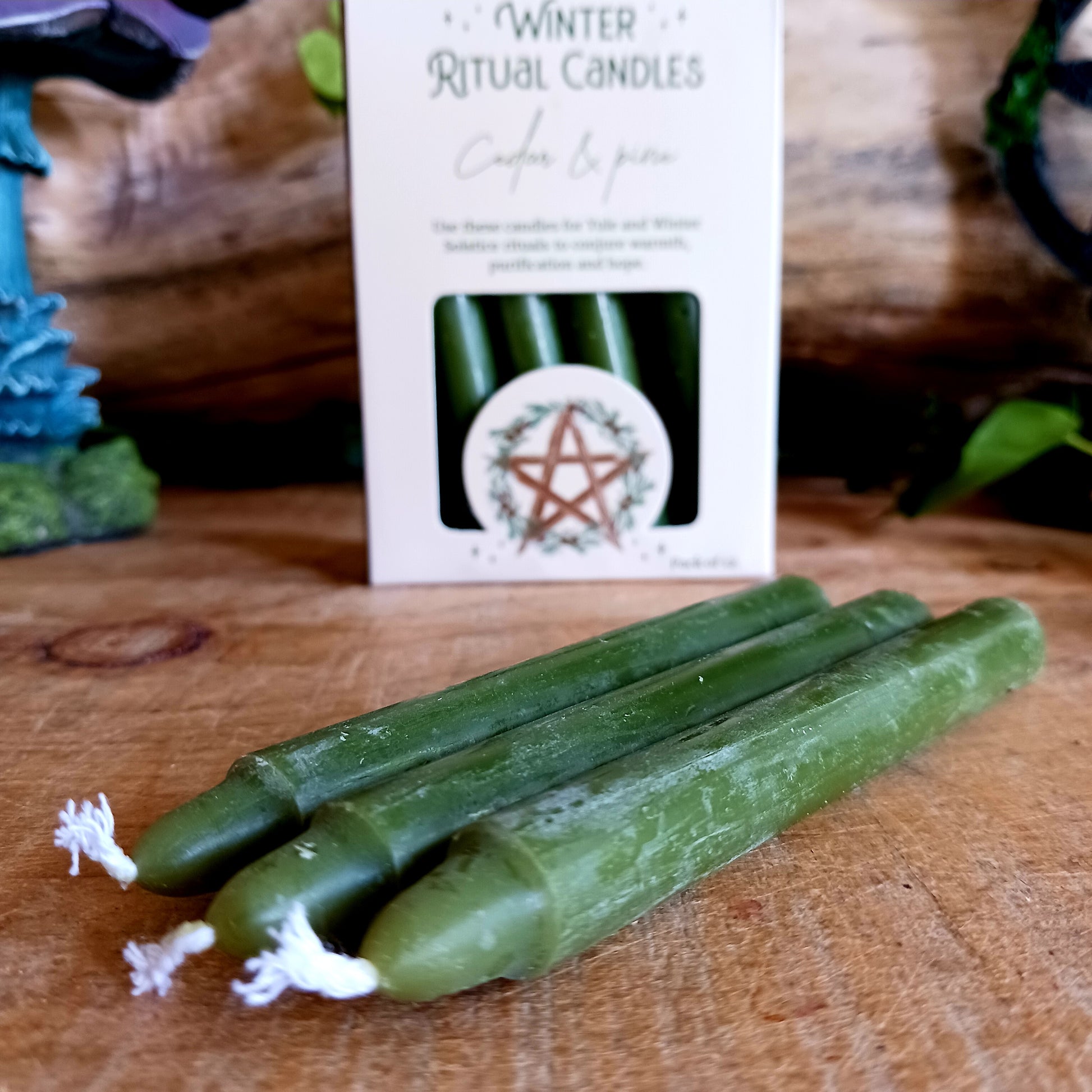 A pack of 12 Winter Ritual candles in a Cedar and Pine fragrance. Use these candles for Yule and Winter Solstice rituals, the ancient pagan holiday known for traditions and rituals that celebrate nature, rebirth, transformation and the oncoming season, to conjure warmth, purification and hope.