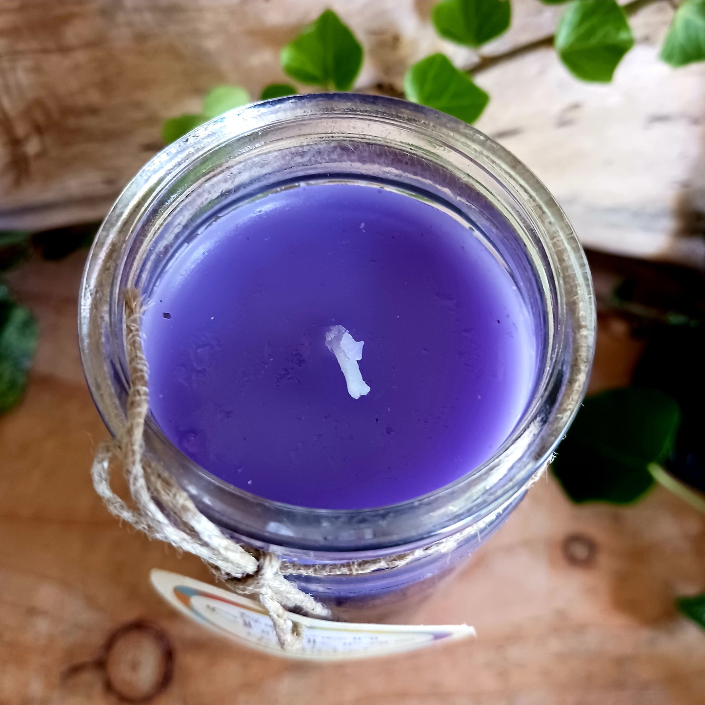 These tall tube candles have different coloured wax for each of the seven different chakras. The candle is presented in a tall glass holder with each chakra symbol over the relevant colour of wax.