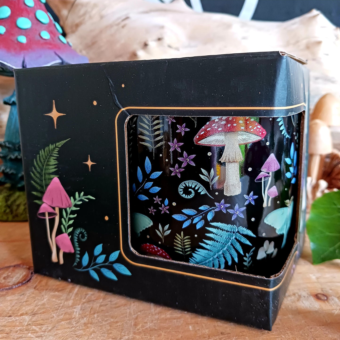 This black ceramic mug features a fabulous mystical forest print with magical mushrooms, toadstools and other forest flora & fauna. It's sure to start your morning off with a touch of magic and wonder!