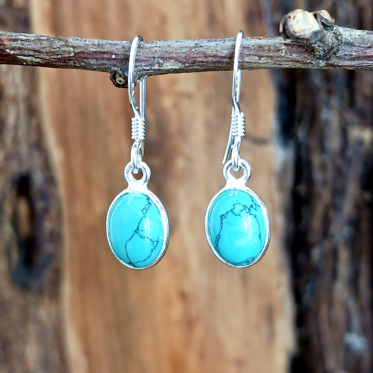 These pretty Turquoise oval earrings are a perfect addition to any outfit.