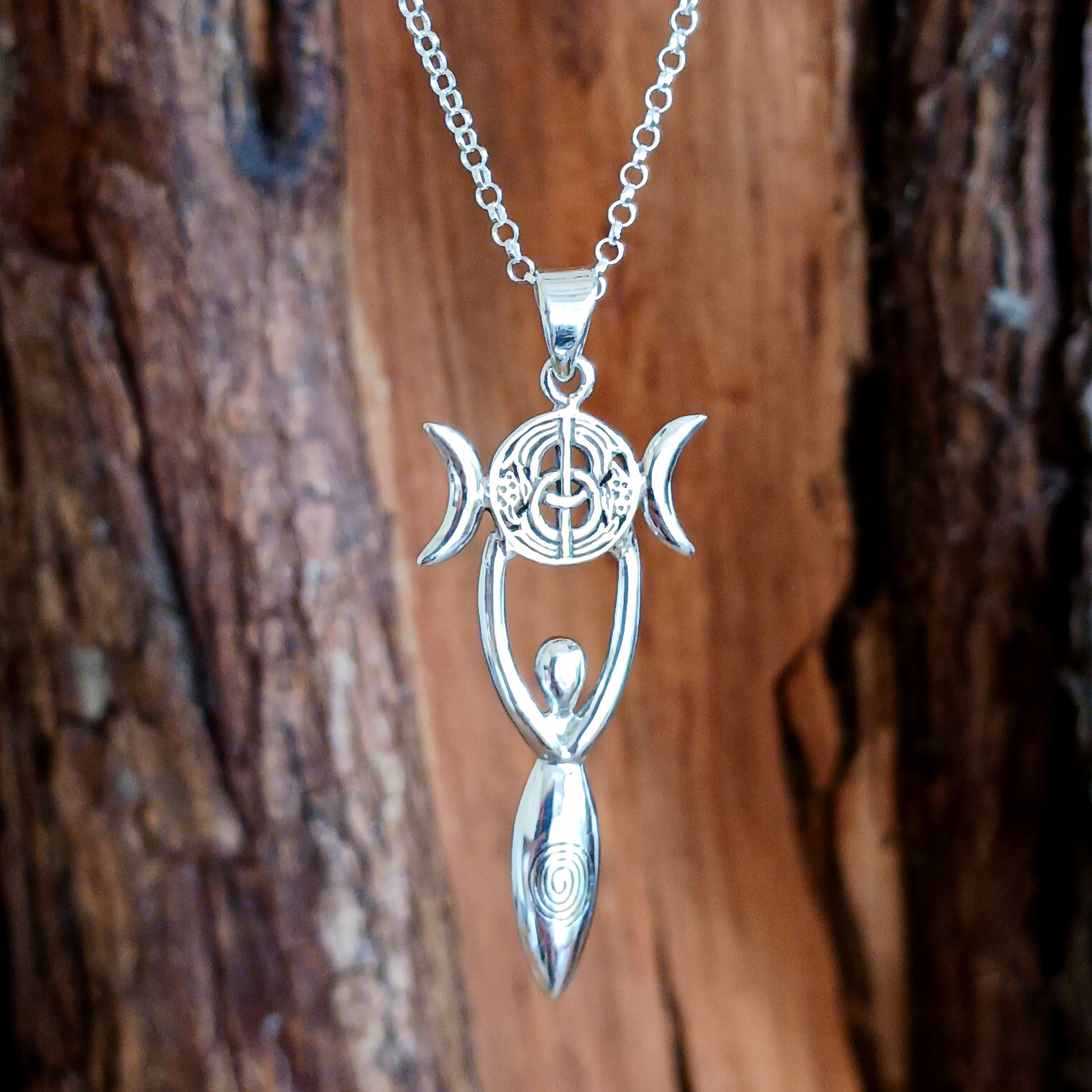 Inspired by the goddess of the triple moon, this exquisite 925 sterling silver pendant also features the Chalice Well and the Spiral of Life symbols.