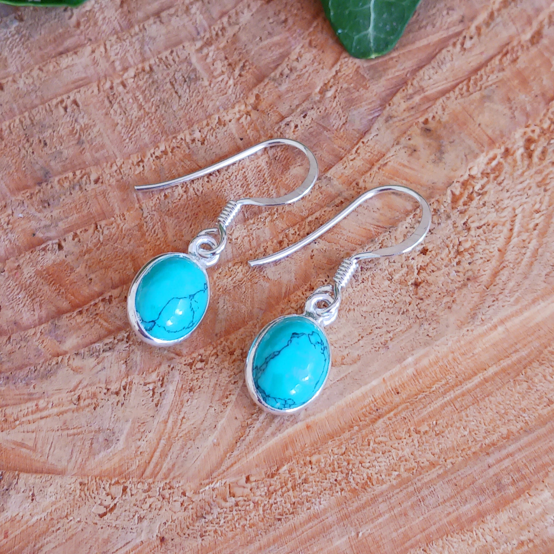 These pretty Turquoise oval earrings are a perfect addition to any outfit.