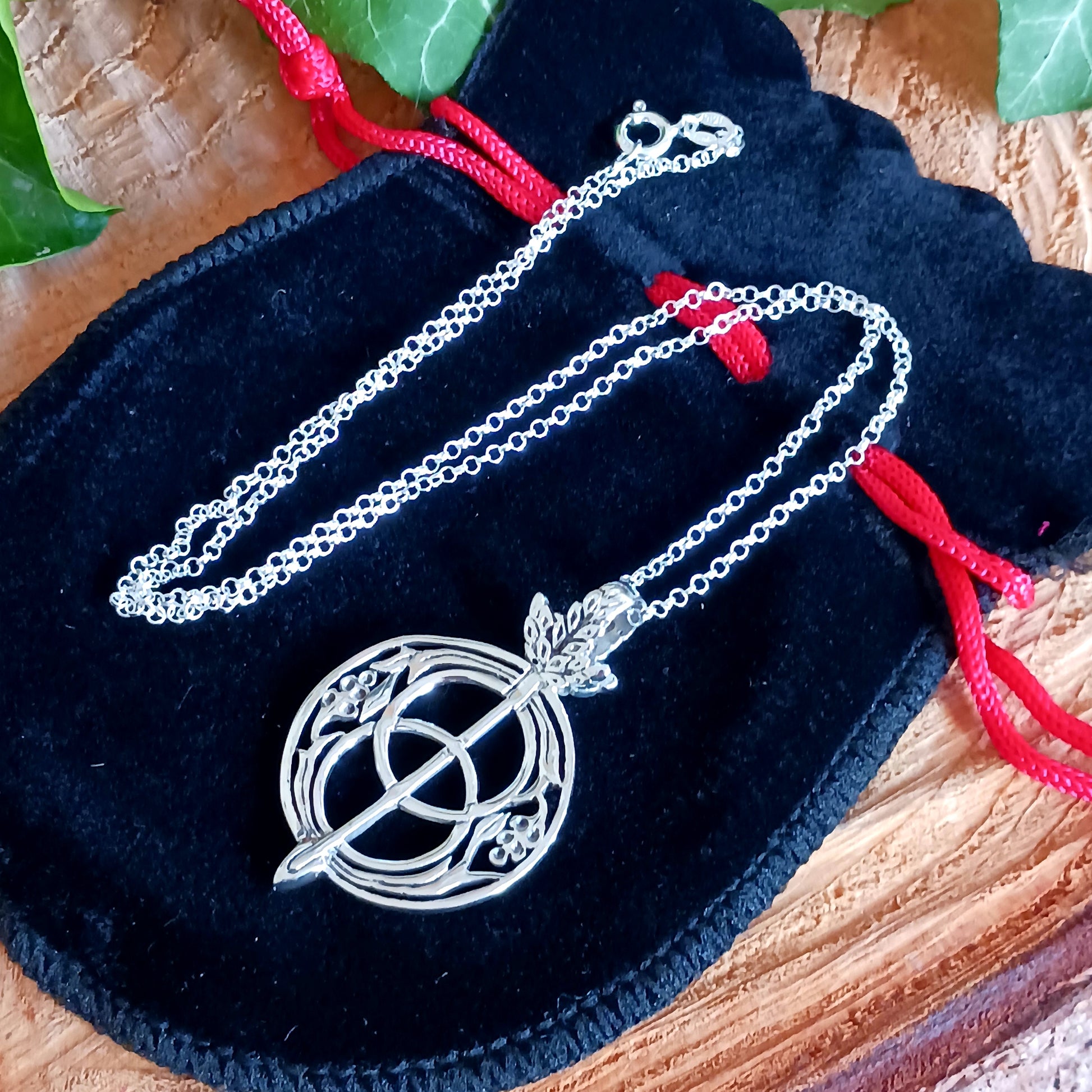 The Chalice Well is a sacred well situated at the foot of Glastonbury Tor. This symbol is found at the well. Tranquil waters at the well represent the blood of Christ.