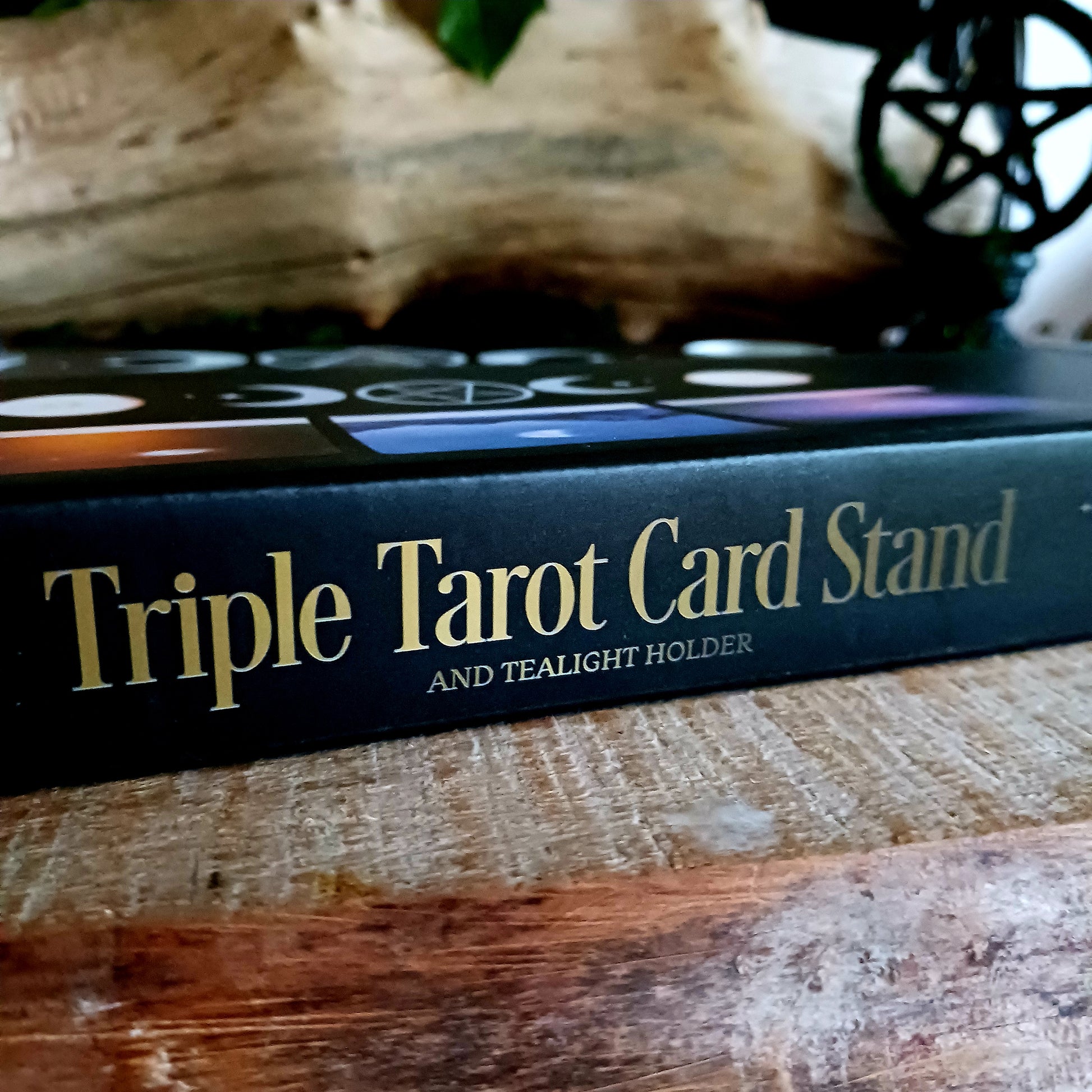 You can display your tarot card readings with this black wooden triple moon tarot card stand, that comes complete with two spaces for holding tealight candles to create ambiance, and allow the meaning of the cards to resonate.