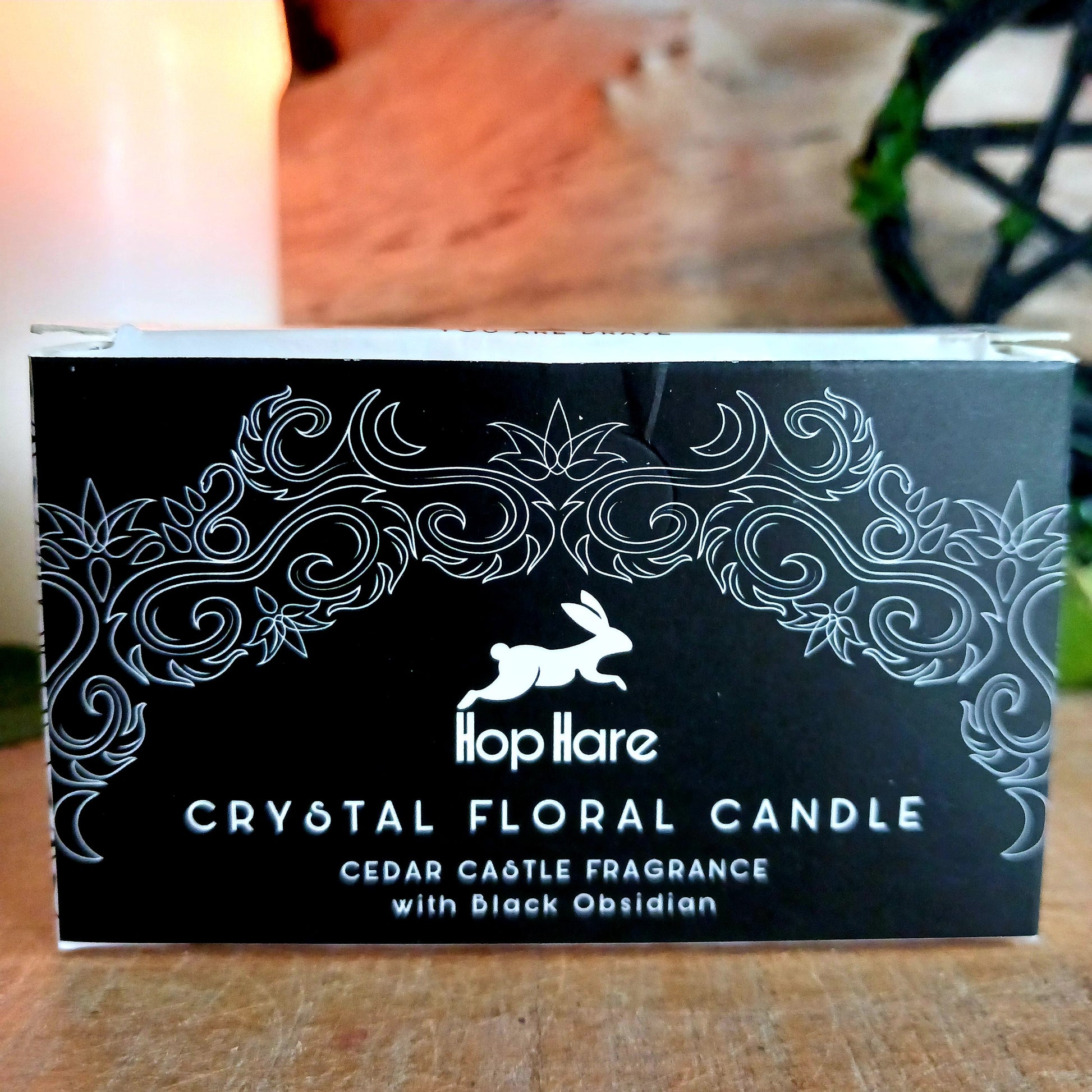 Step into the mystical world with Hop Hare Crystal Magic Flower Candle - The Knight of Swords, crafted with Black Obsidian Gemstones and dry flowers.