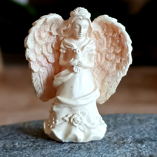 These lovely angels are designed to be placed in and around your home or workplace, in little corners, by the bed, next to your computer screen, by the telephone, or basically anywhere you just want something that catches your eye to remind you that an angelic presence is always with you.