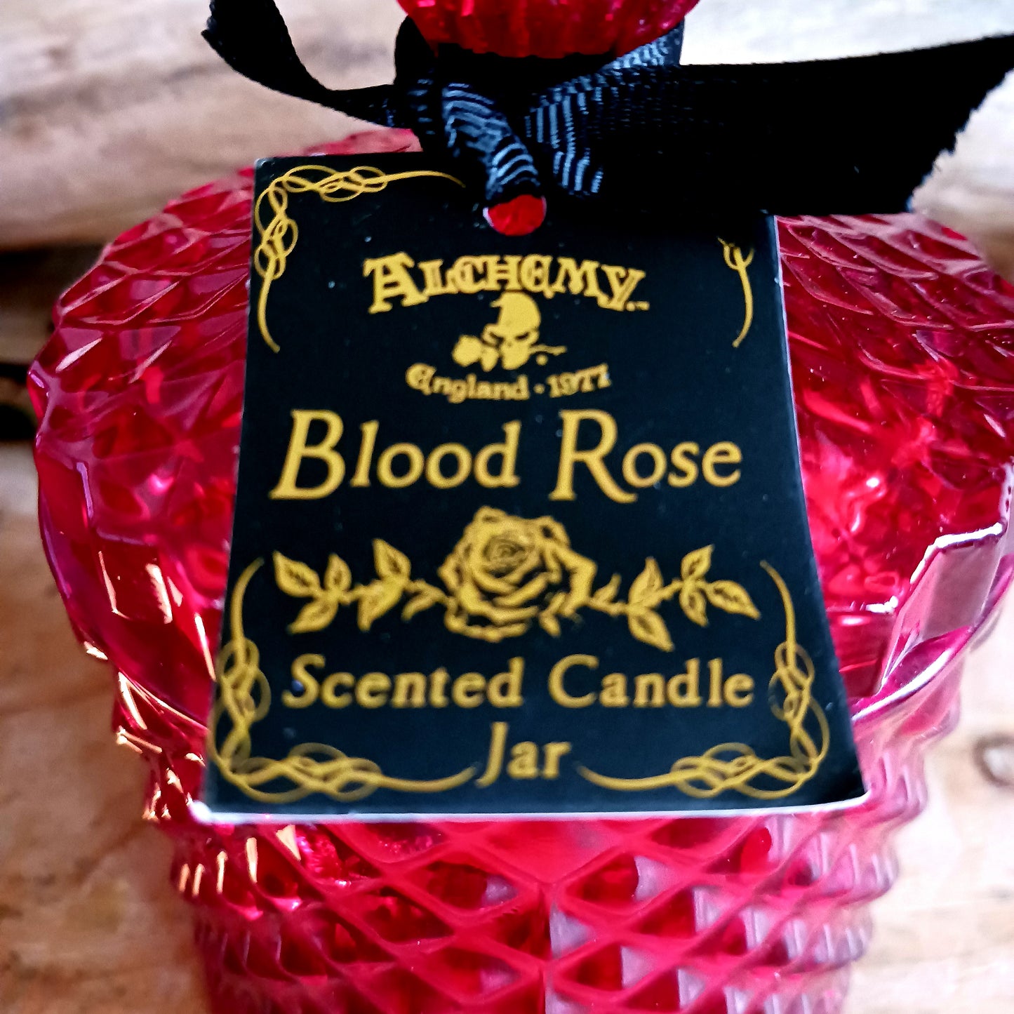 This blood rose red, vintage inspired, lidded candle jar encapsulates a sensual scented candle. Light the candle and the dark sensual aroma of the 'Blood Rose' will envelop your boudoir! Once the candle has burnt, this stunning, cut glass effect jar can then be used to keep safe your trinkets and treasures.