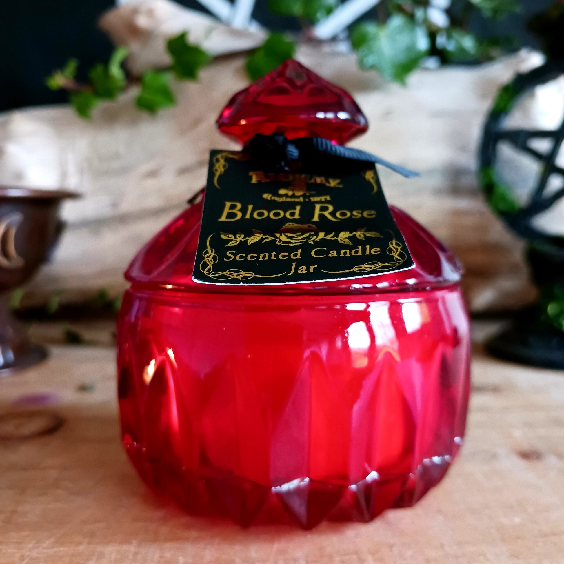 This Blood red vintage inspired, square, cut glass effect lidded candle jar encapsulates a sensual scented candle. Light the candle and let the dark sensual aroma of the 'Blood Rose' envelop your boudoir! Once the candle has burnt, this stunning, cut glass effect, jar can then be used to keep safe your trinkets and treasures.