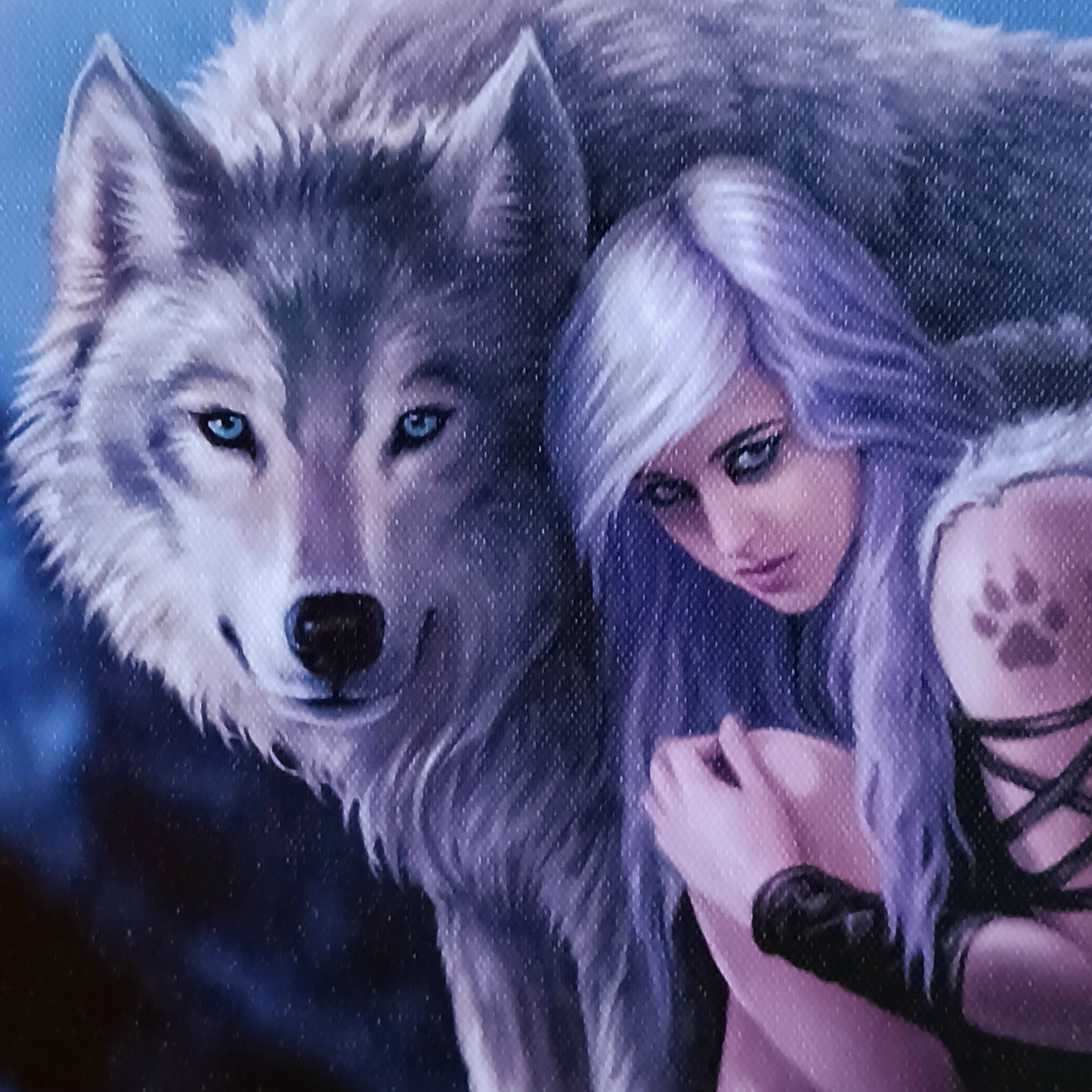 This stunning canvas by Anne Stokes entitled Protector, features a bold wolf protector design that is sure to add strength, power, and protection to any space. The detailed work of world-renowned artist Anne Stokes ensures that the protector is a one-of-a-kind piece, expertly crafted for lasting quality and beauty.