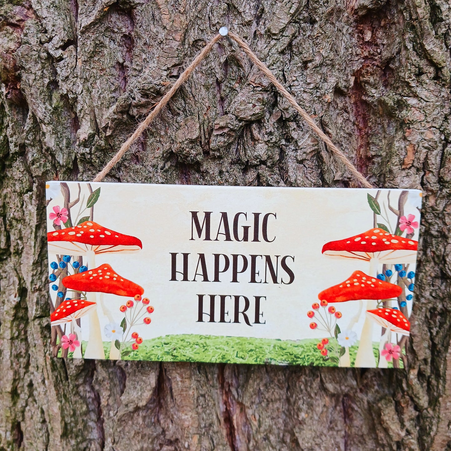 Fill your home with signs of magic - literally- with this sweet hanging sign that gives enchanted forest feels with its whimsical toadstool design.