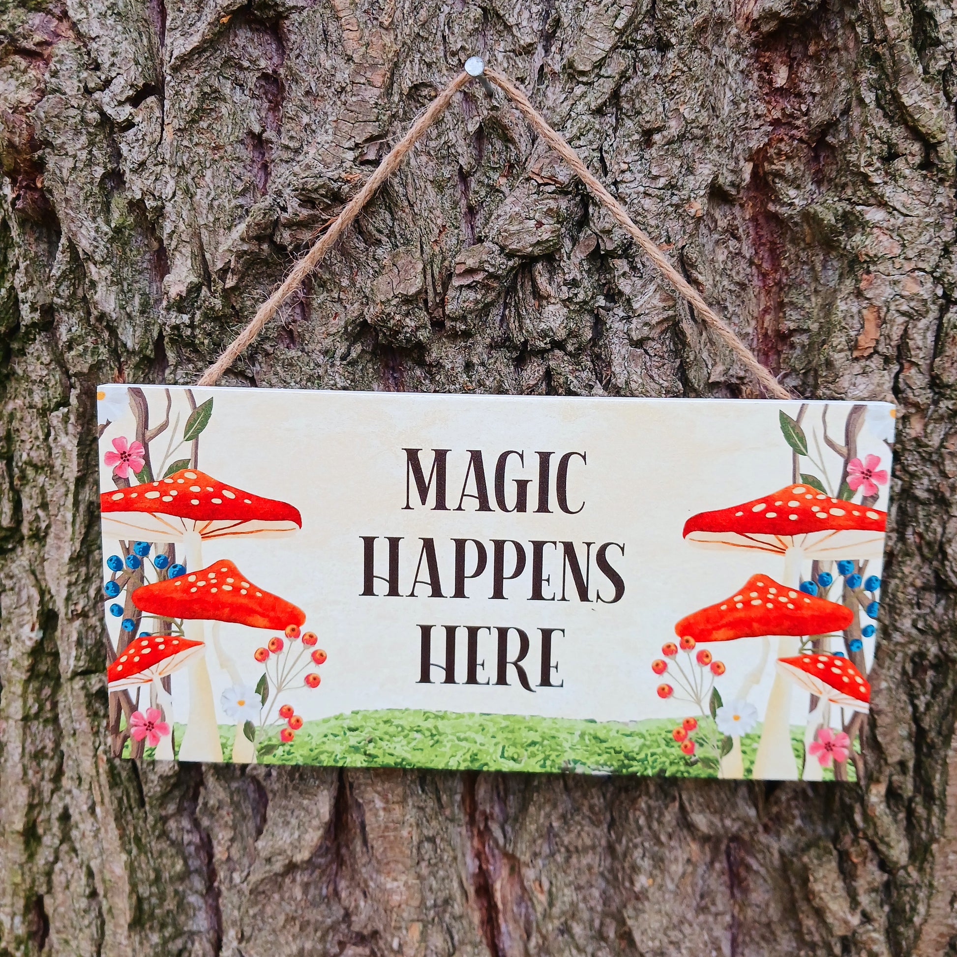 Fill your home with signs of magic - literally- with this sweet hanging sign that gives enchanted forest feels with its whimsical toadstool design.