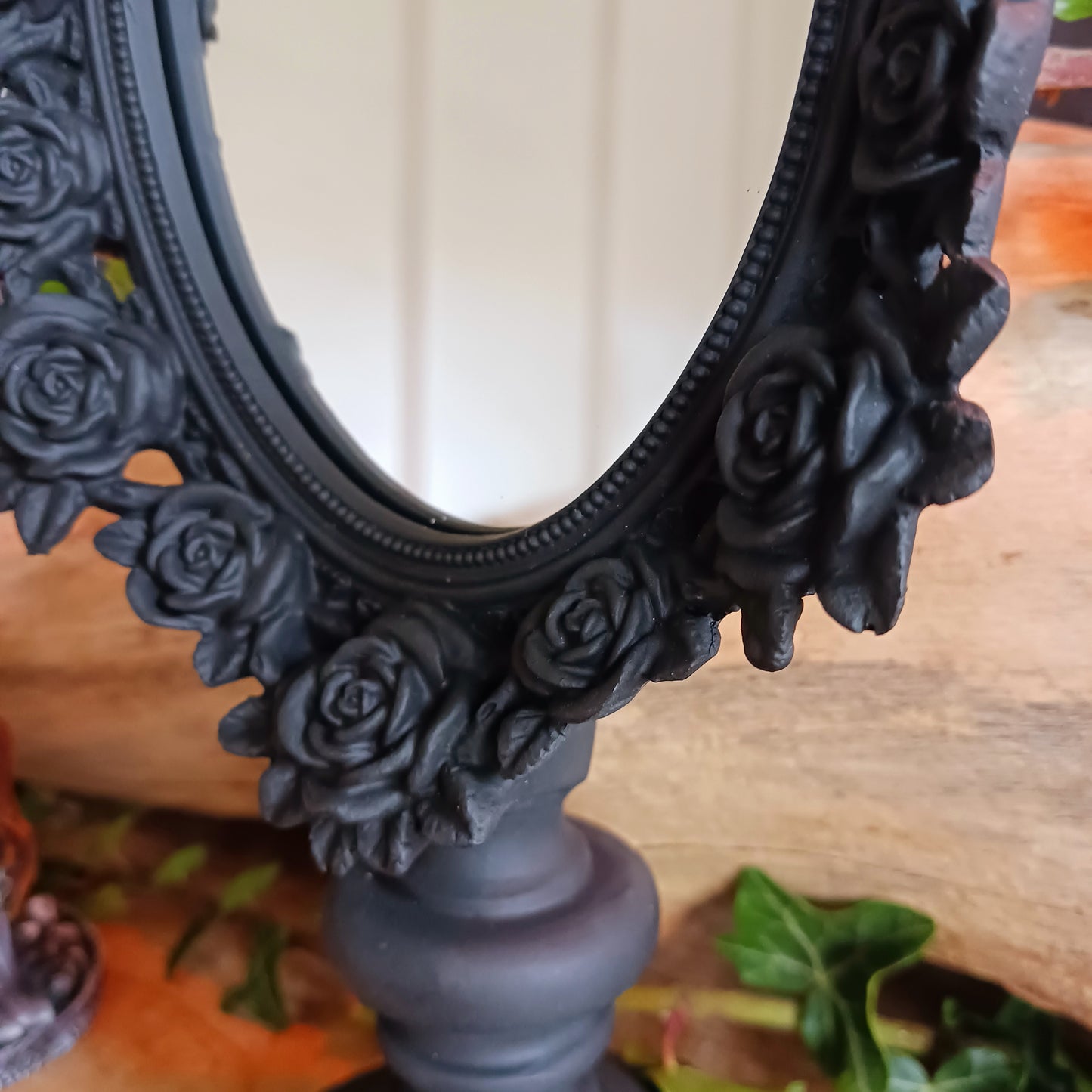 This stunning mirror will make a beautiful addition to your boudoir and dressing table. Delicately decorated with Black Rose detail, this gorgeous mirror is a perfect size for your morning make-up application.&nbsp; It will also make a delectable gift for a loved one!