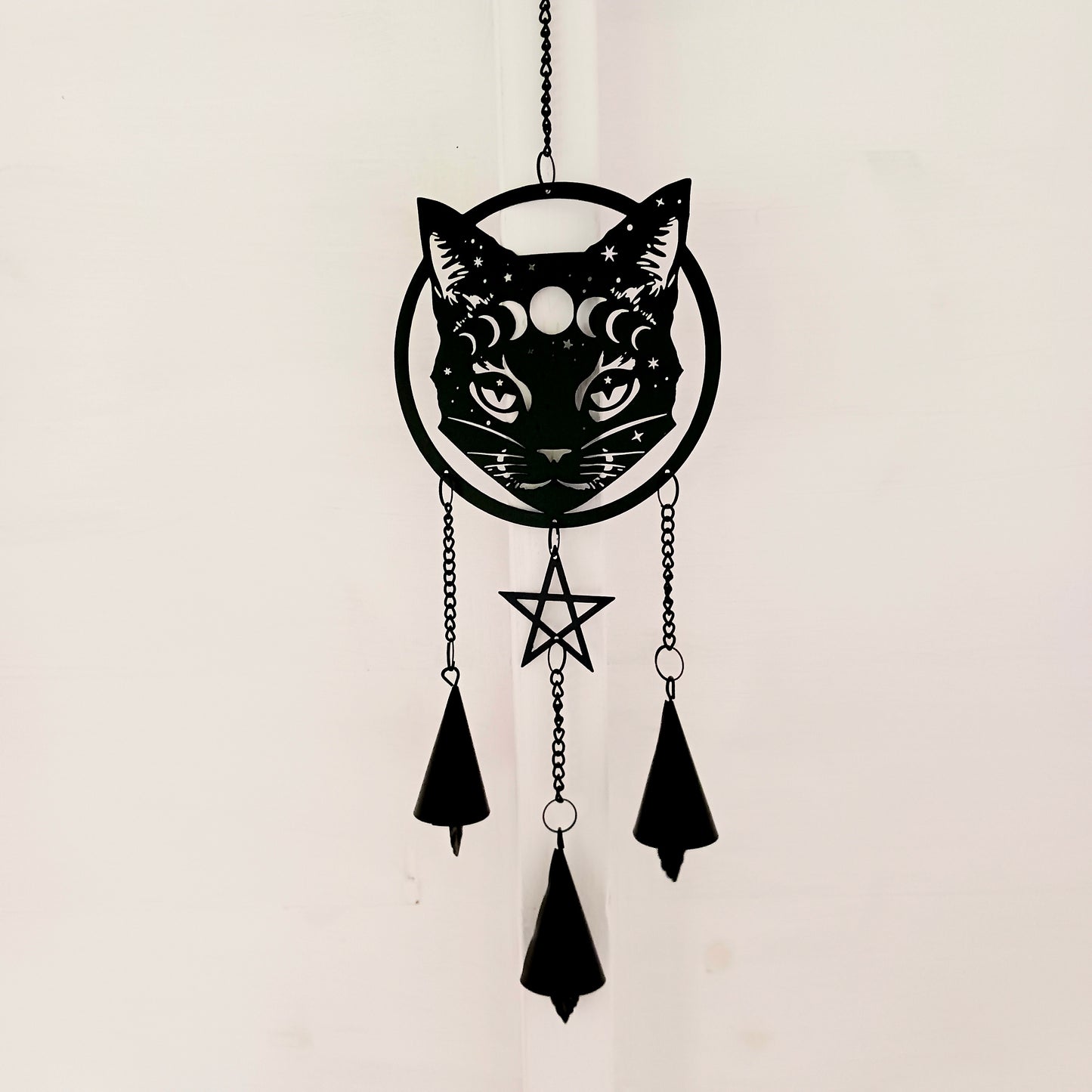 From the Alchemy England hanging decoration collection, this magic black cat face with moon phase and stars has three magical chimes!