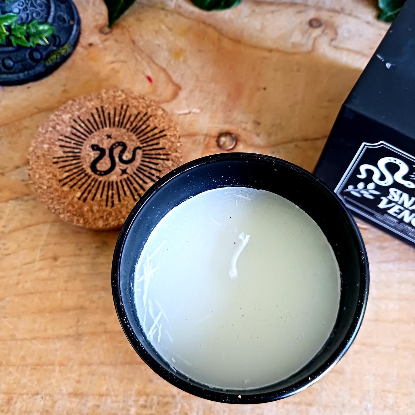 Add a little magic to your space with this bewitching ritual Snake Venom candle.  Featuring an enchanting scent of Dark Opium and a mystical cork lid, this candle is idea for use in any ritual, or to give as a thoughtful gift.