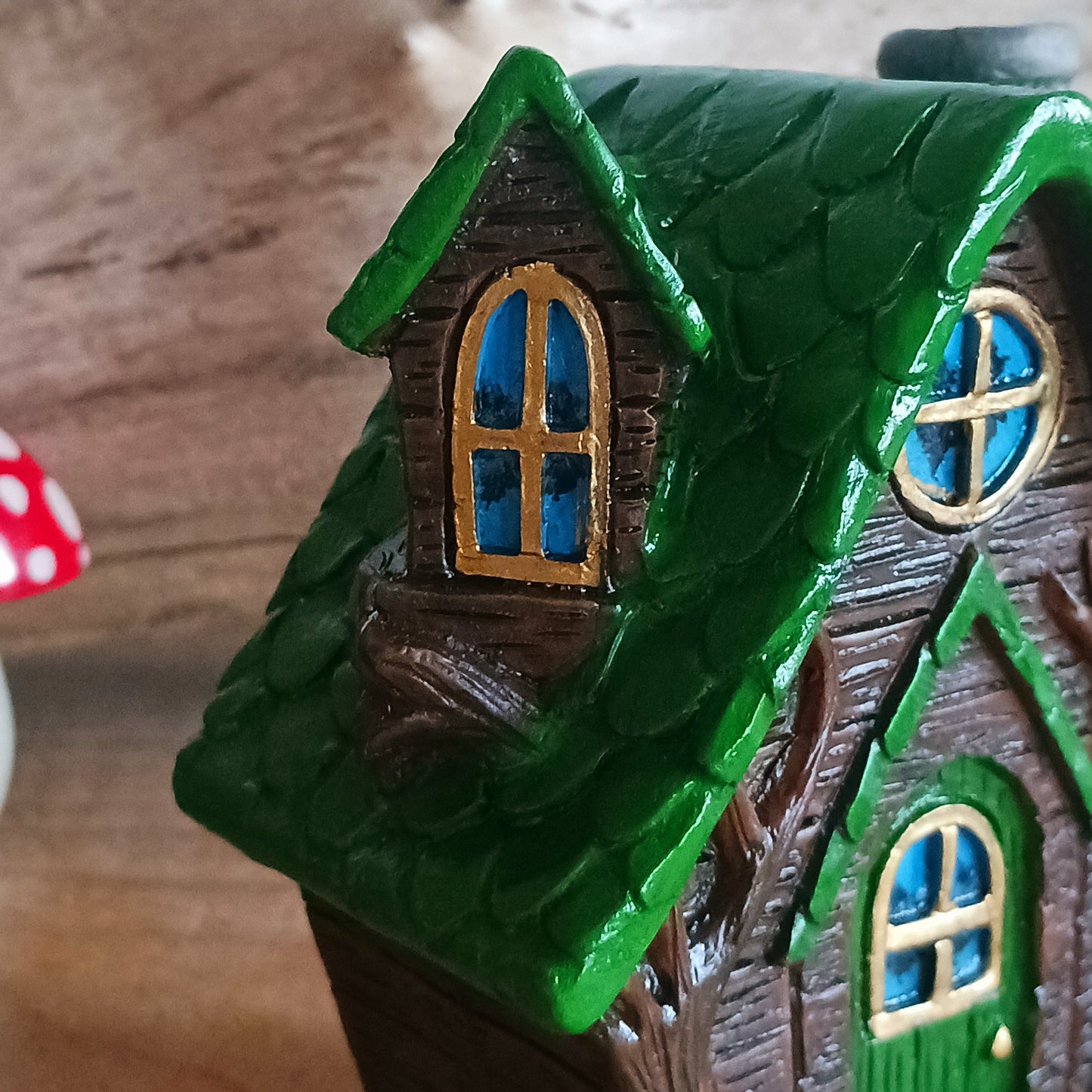 This adorable and detailed incense cone burner is shaped like a little fairy house called Woody Lodge.  Designed by Lisa Parker, you place an incense cone inside the Woody Lodge and watch as smoke rises from the chimney. The house comes in a little gift box making it the perfect gift for fairy and incense lovers!