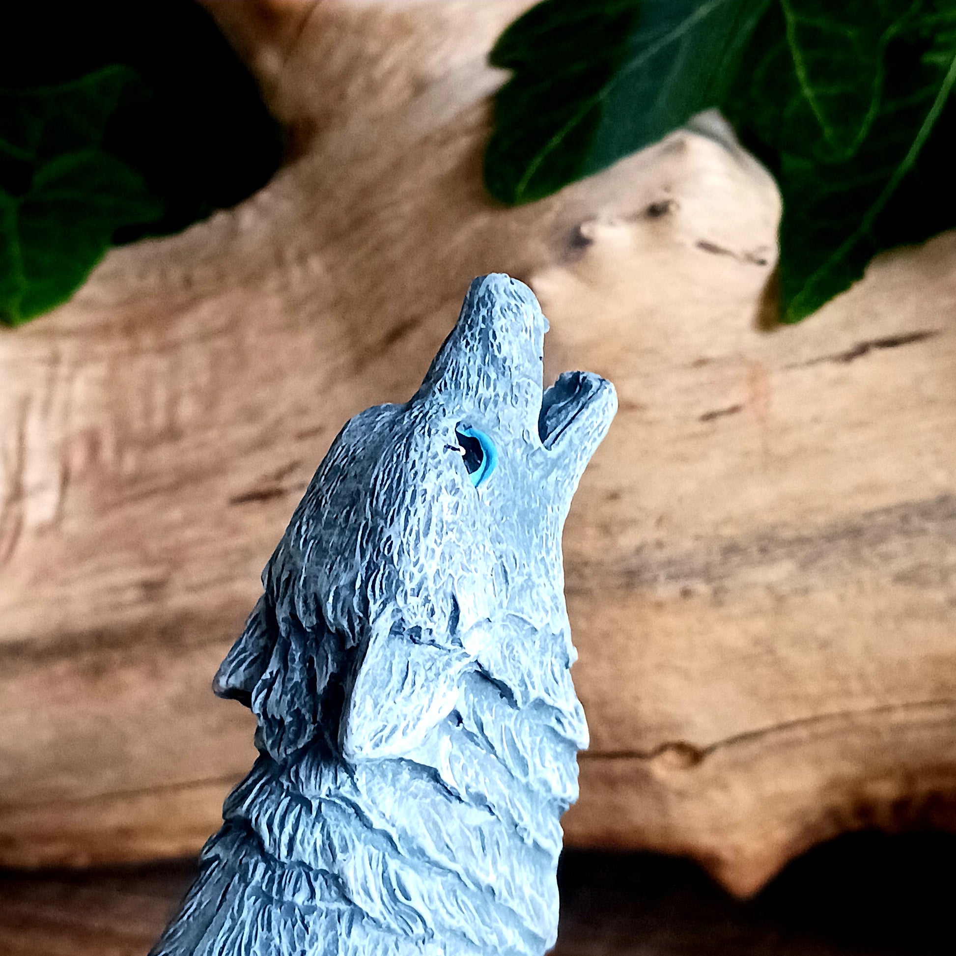 This detailed howling wolf incense cone burner has been designed by Lisa Parker. When the incense cone is burning, smoke rises from the mouth of the howling wolf.