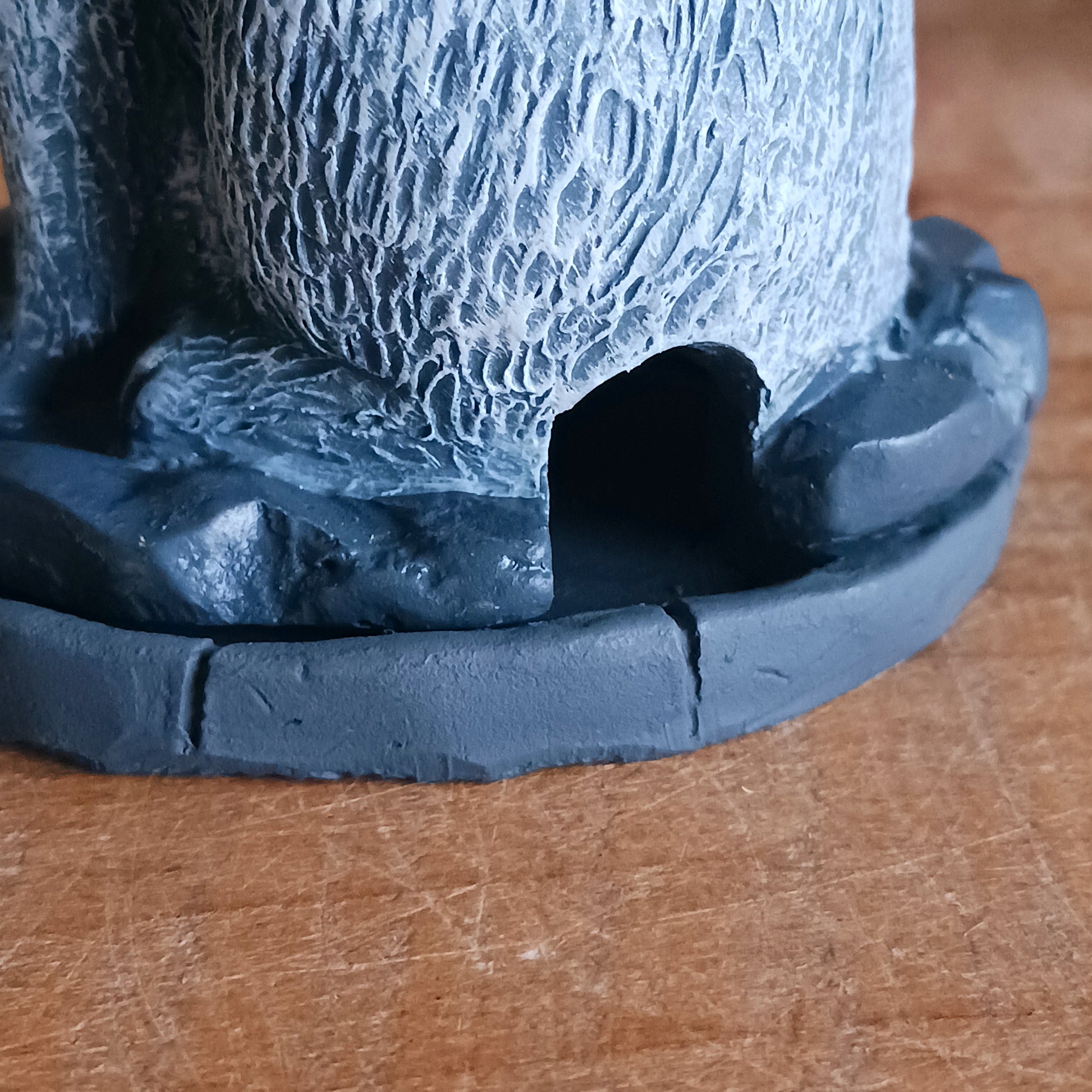 This detailed howling wolf incense cone burner has been designed by Lisa Parker. When the incense cone is burning, smoke rises from the mouth of the howling wolf.