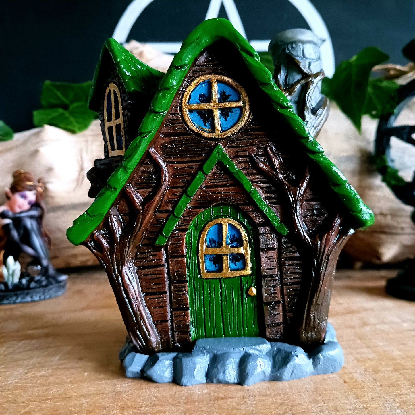 This adorable and detailed incense cone burner is shaped like a little fairy house called Woody Lodge.  Designed by Lisa Parker, you place an incense cone inside the Woody Lodge and watch as smoke rises from the chimney. The house comes in a little gift box making it the perfect gift for fairy and incense lovers!